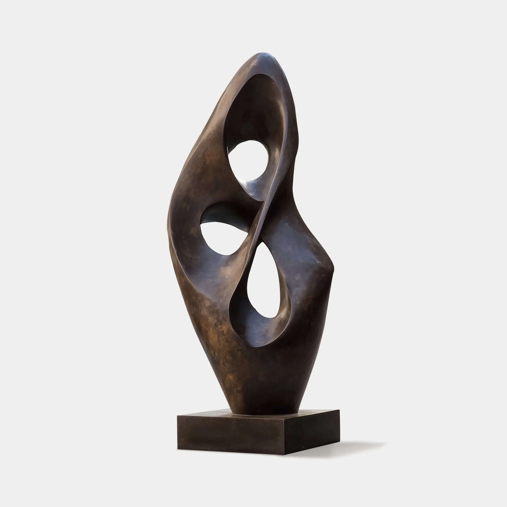 Abstract sculpture in bronze with modern design for poolside.