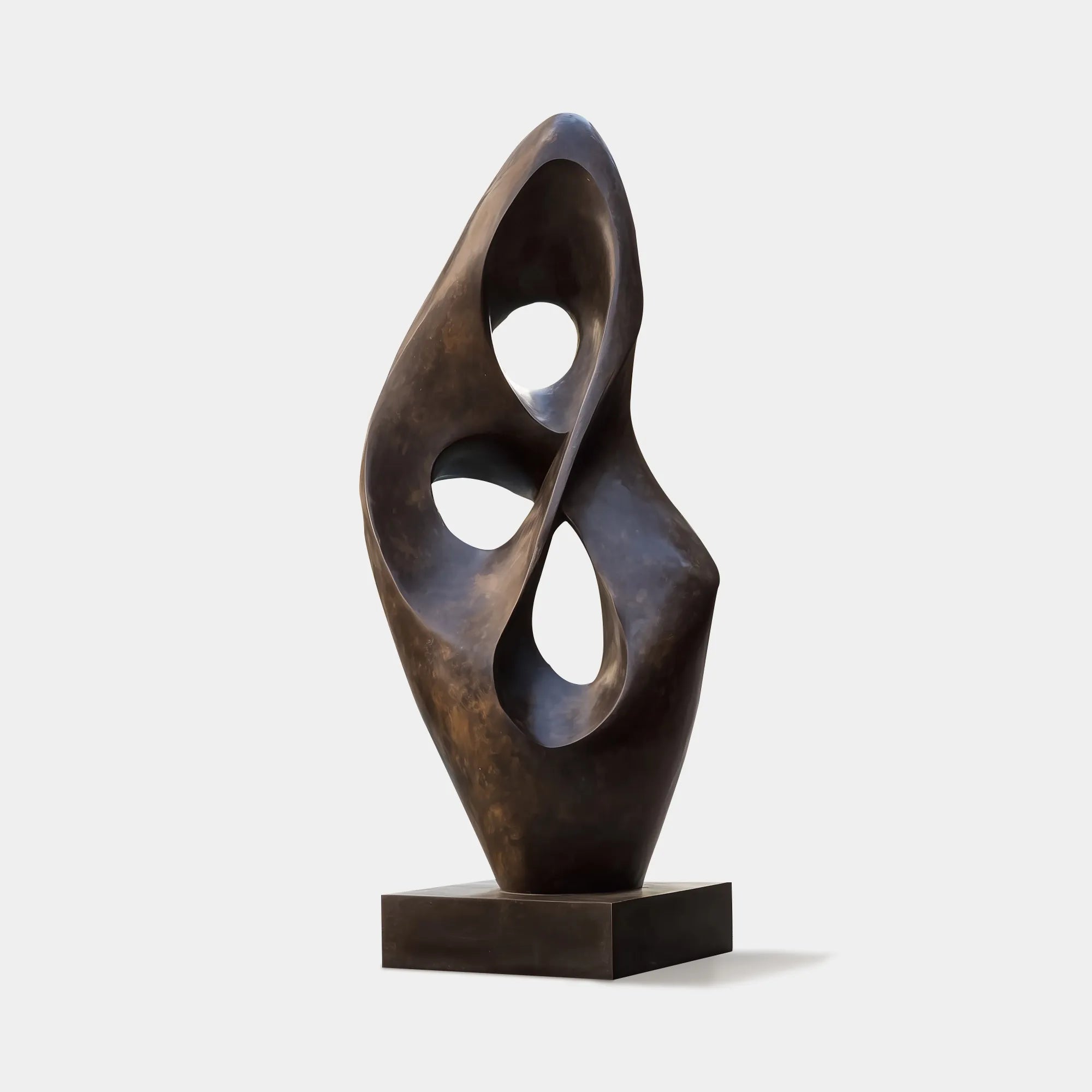 Abstract sculpture in bronze with modern design for poolside.