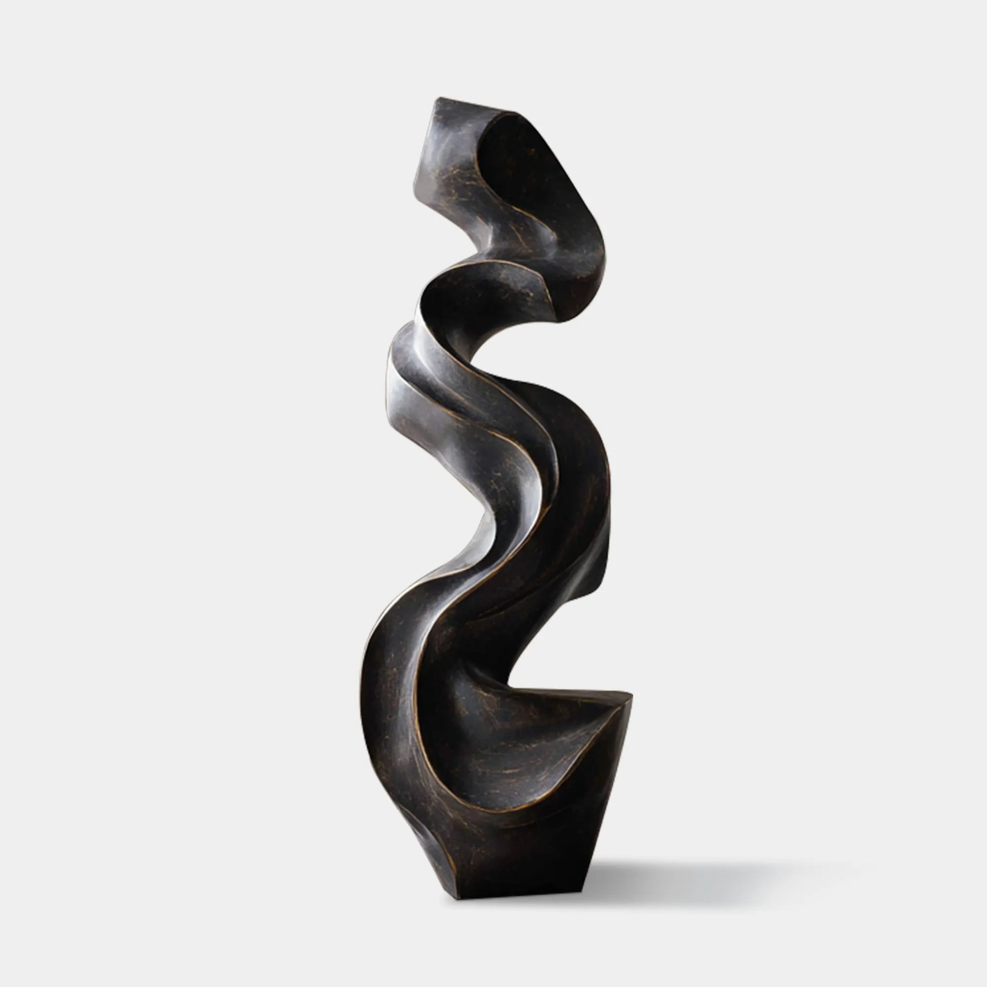 Modern bronze sculpture with waveform design for indoors.