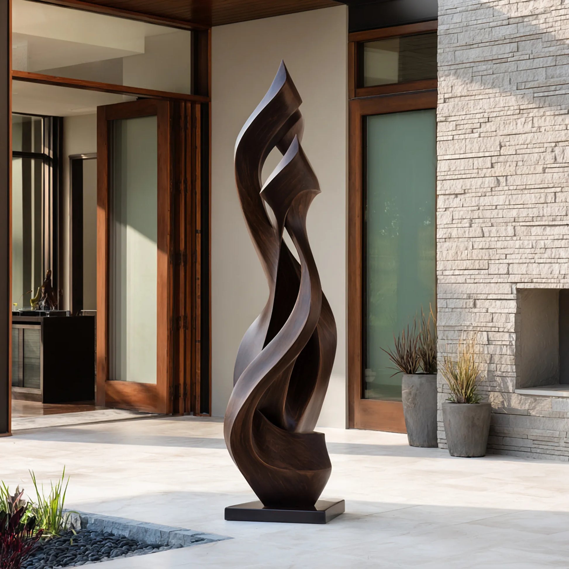 Abstract bronze sculpture with flowing, wave-like curves for modern villa courtyards.