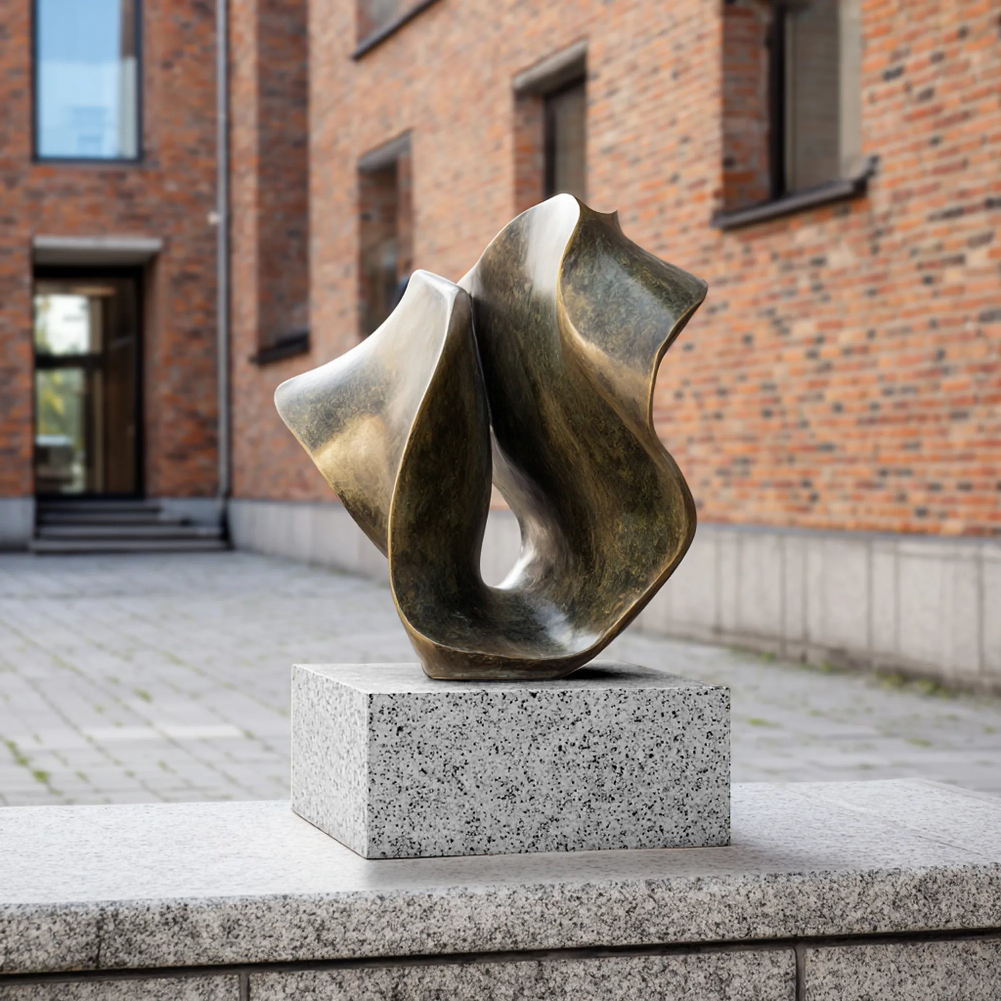 Abstract bronze sculpture for luxury spaces.