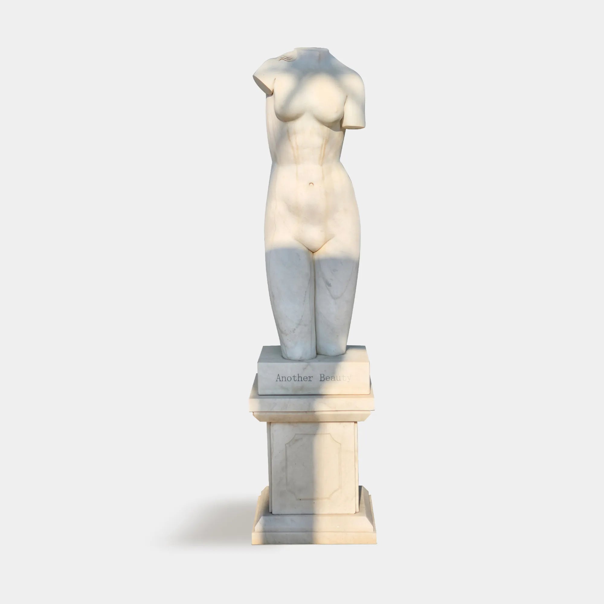 Female Torso Marble Sculpture in Timeless Classical Style.