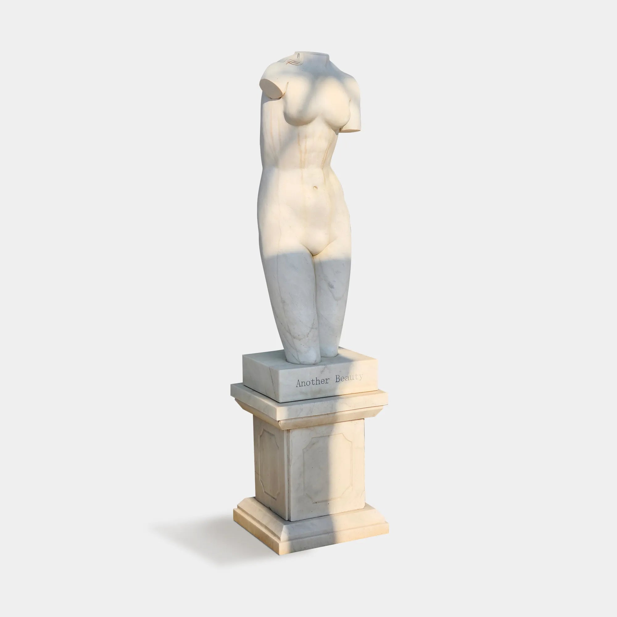 Female Torso Marble Sculpture in Timeless Classical Style.