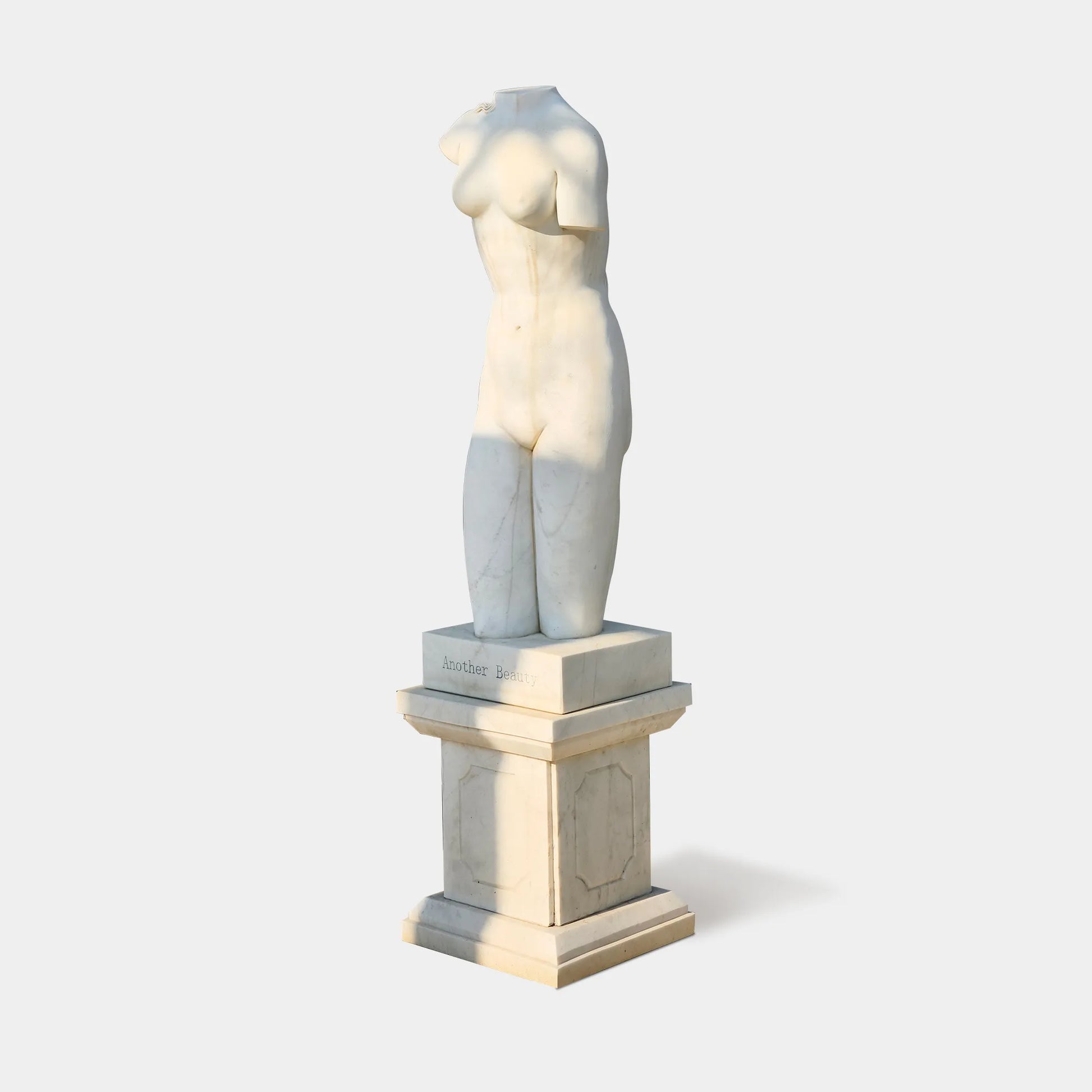 Female Torso Marble Sculpture in Timeless Classical Style.