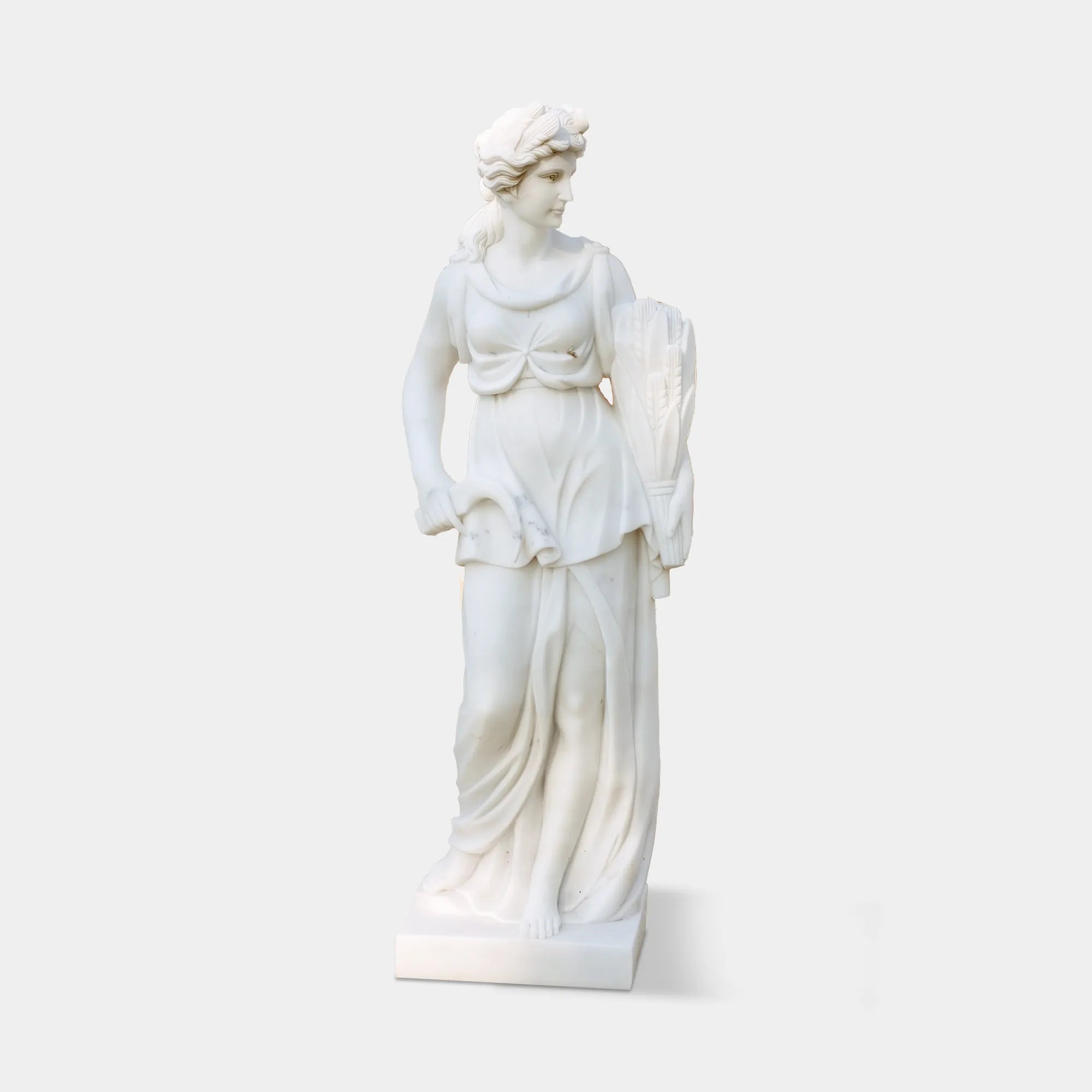 Marble sculpture of the Goddess of Harvest holding wheat, a symbol of abundance and fertility, ideal for garden settings.