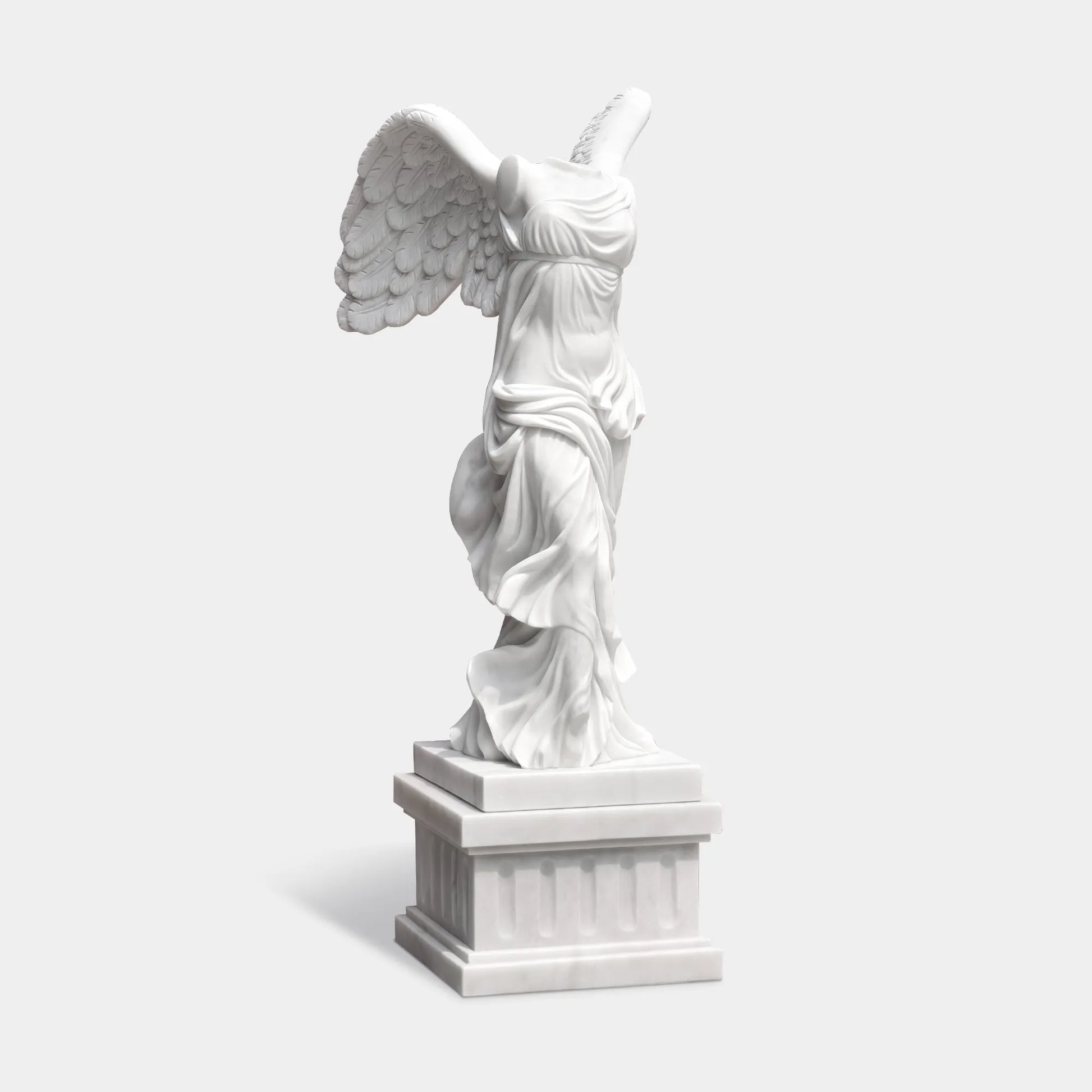 Classical marble sculpture of the Winged Victory of Samothrace with flowing drapery and soaring wings for luxury villas, courtyards, and art galleries.