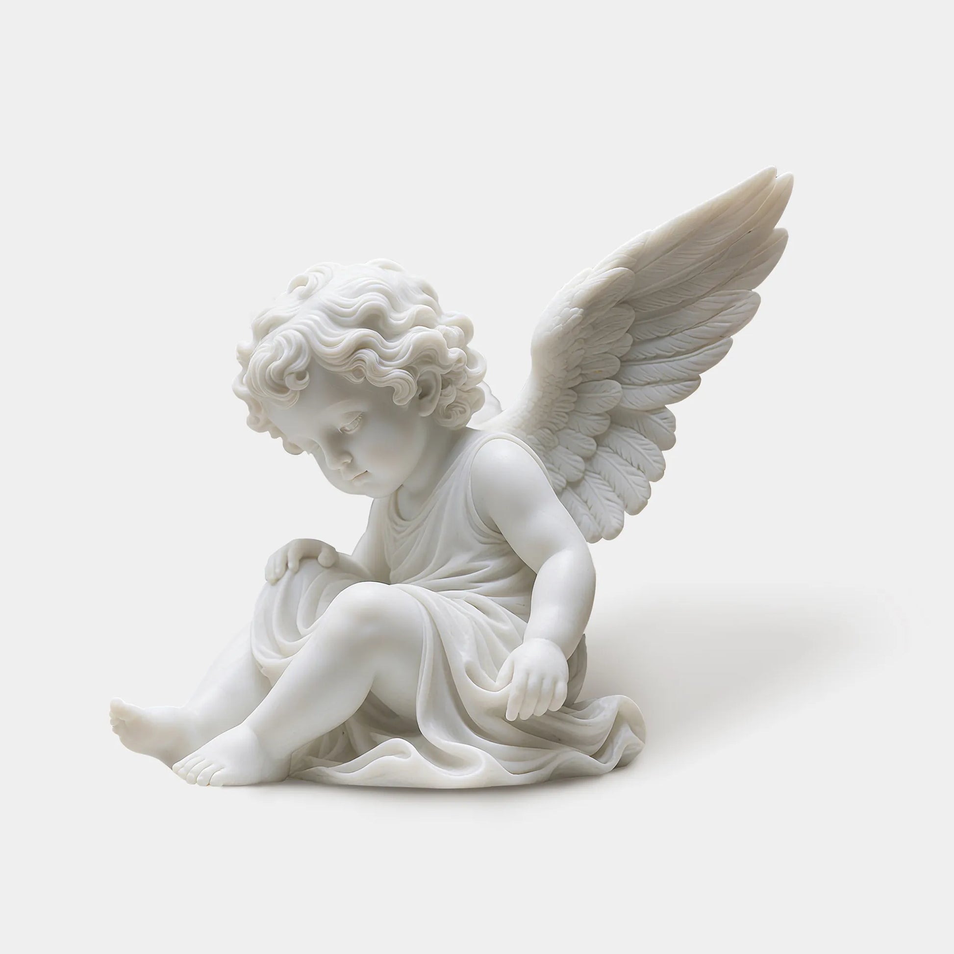 Classical marble sculpture of a seated cherub angel with uplifted wings for gardens and villa courtyards.