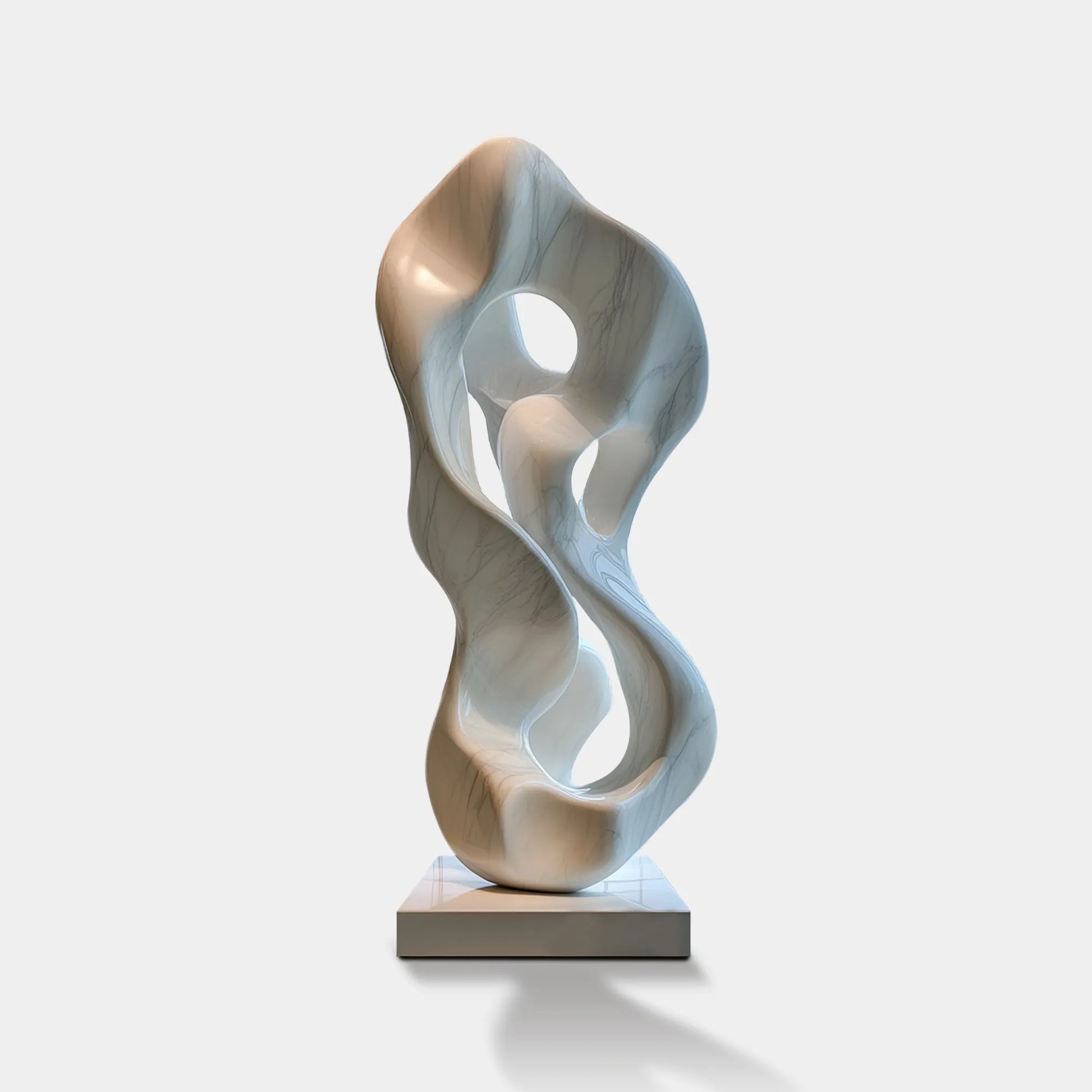 White marble sculpture with organic form design, ideal for modern villas, gardens, and galleries.