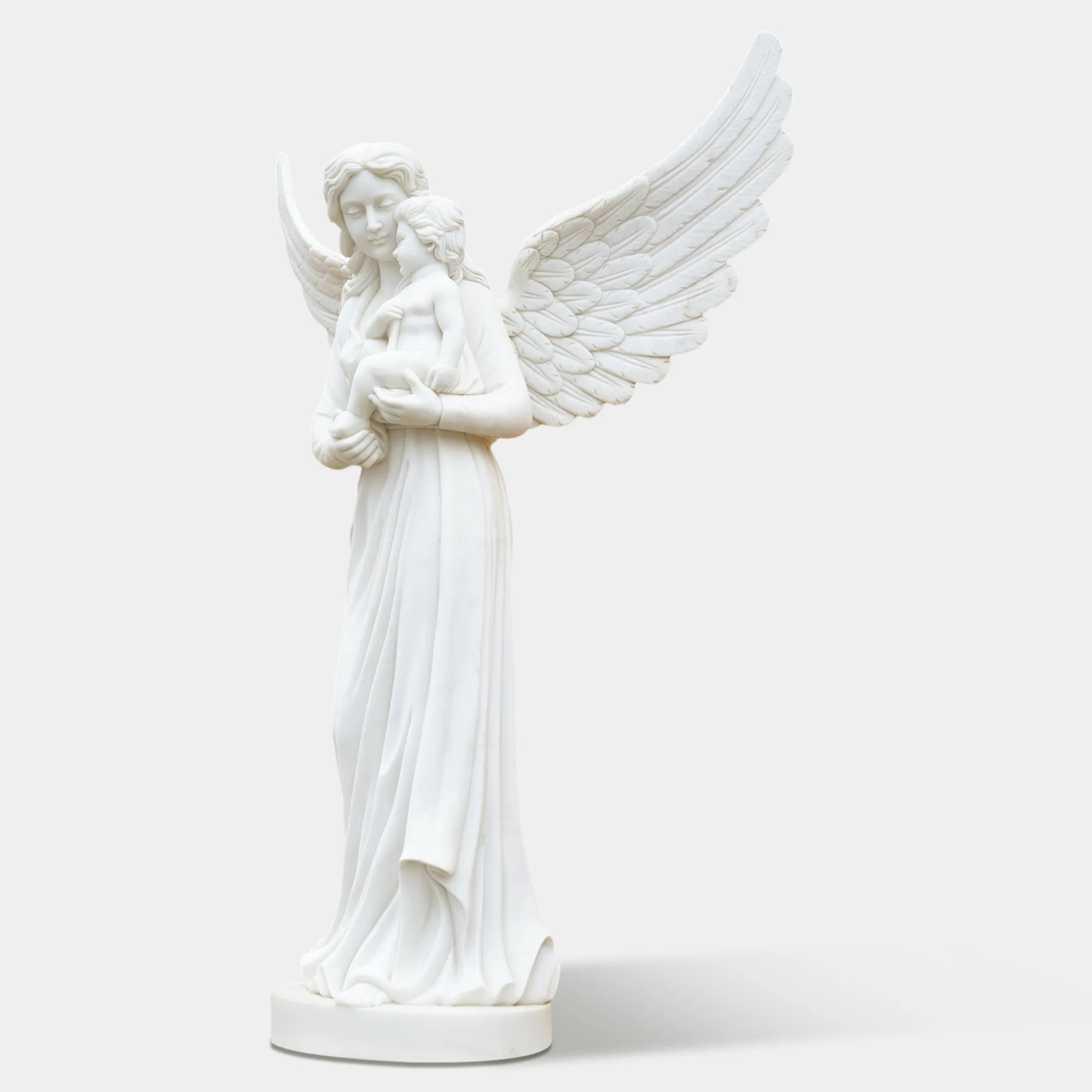 Outdoor marble angel with child sculpture displayed in a classical garden.