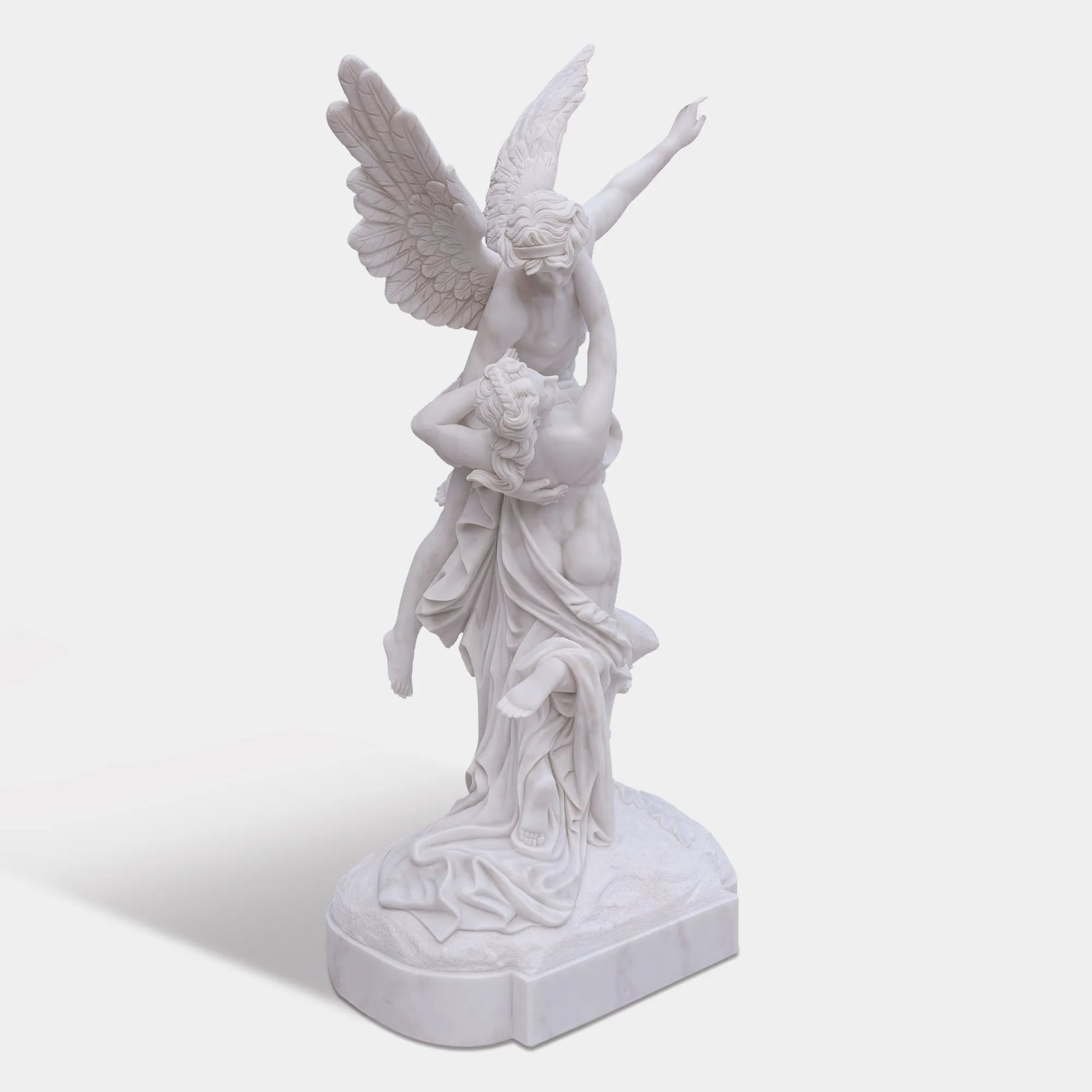 Marble sculpture of Cupid and Psyche with detailed wings and flowing forms.