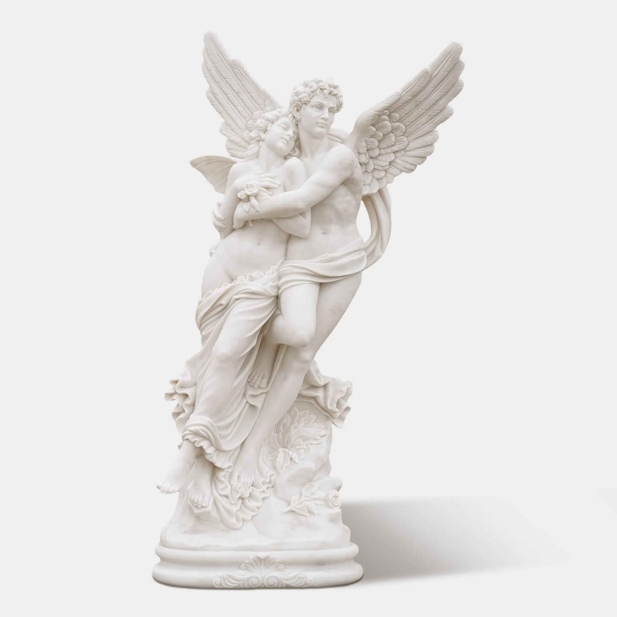 Romantic marble sculpture of Cupid and Psyche in elegant villa garden, showing detailed wings and graceful embrace under sunlight.