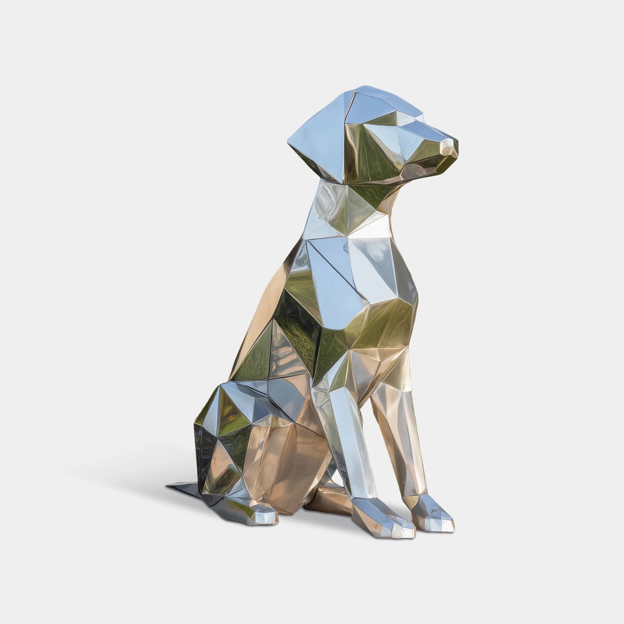 Stainless steel geometric dog sculpture displayed on a lawn in front of a modern residence.