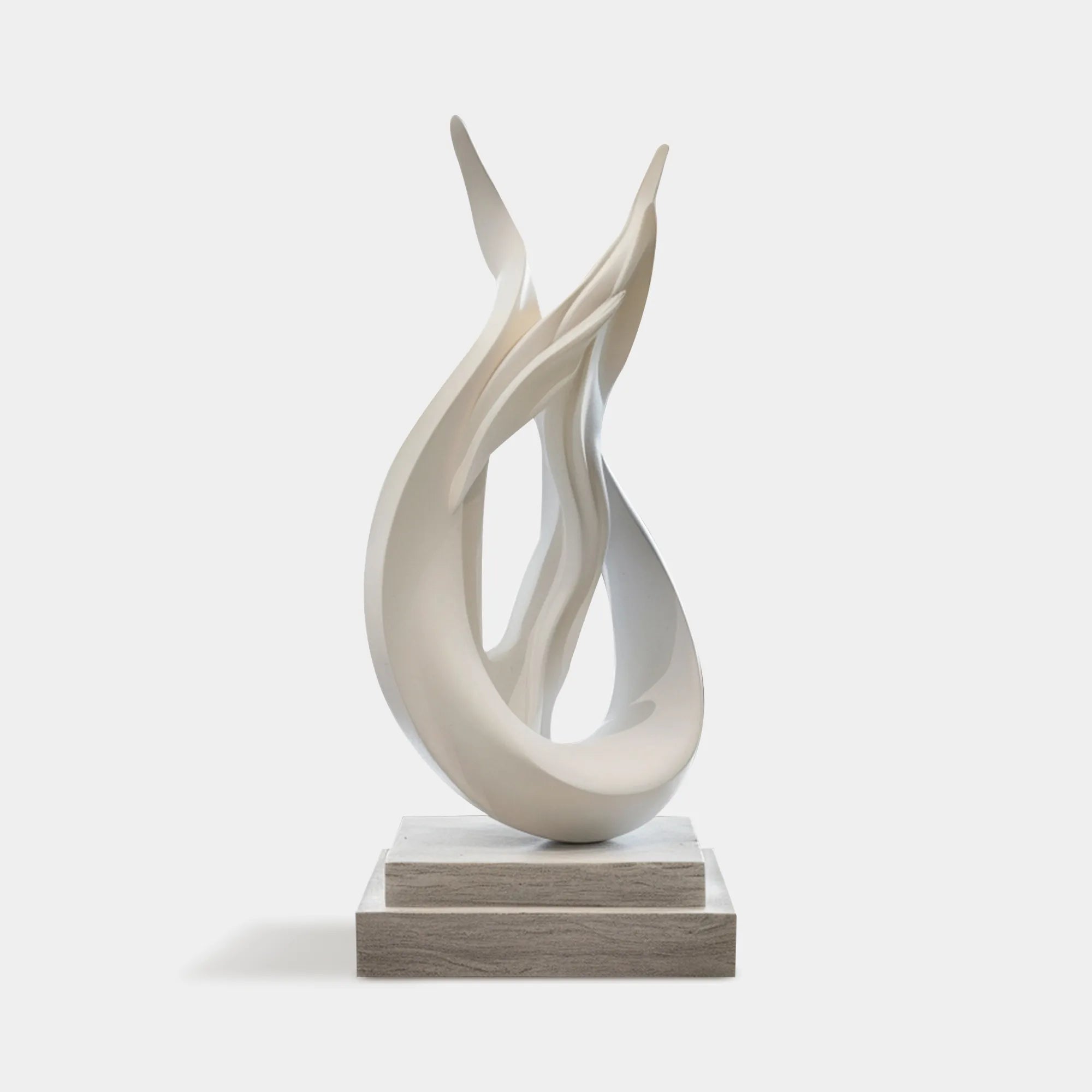 Abstract sculpture in white with flowing form for the living room.