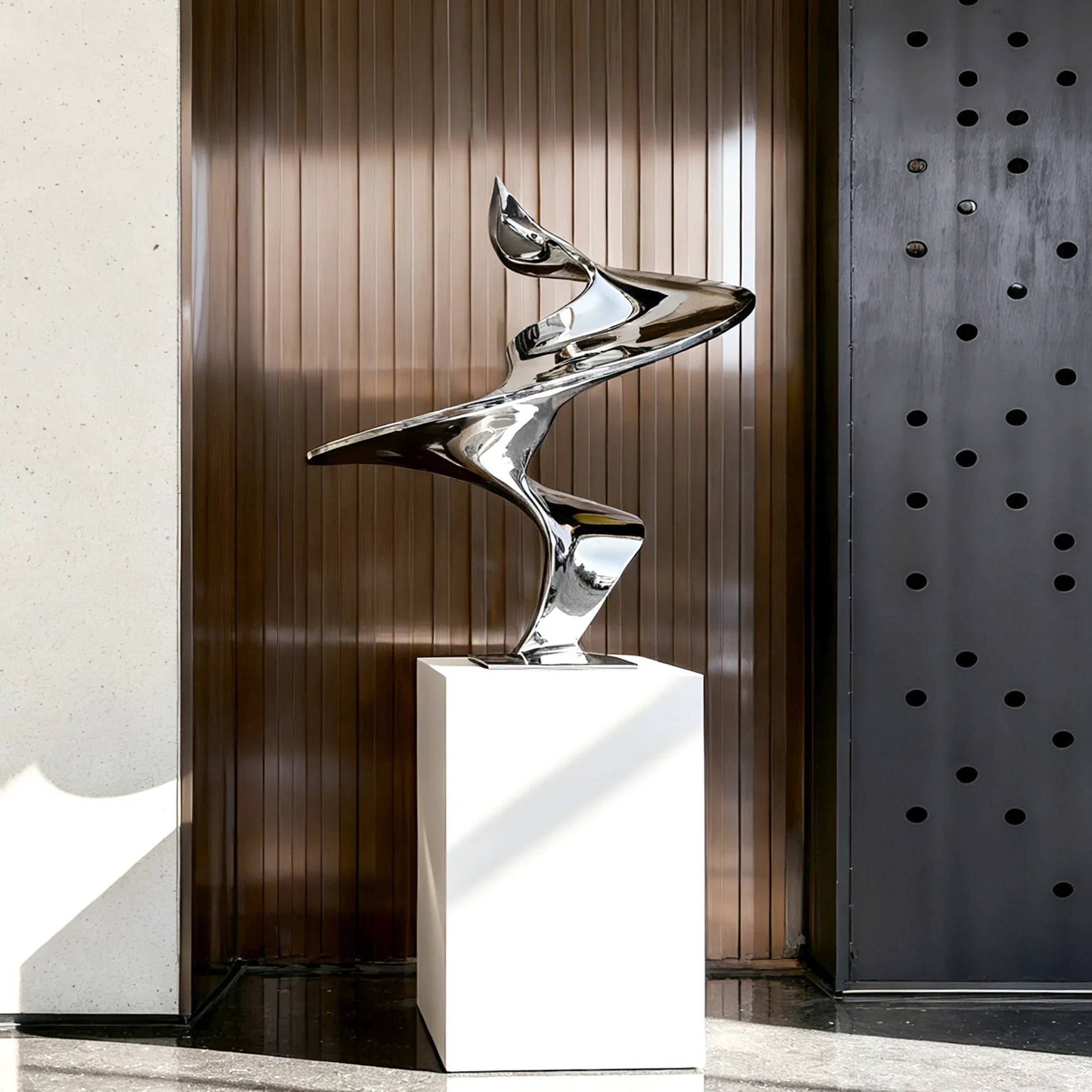 Abstract stainless steel sculpture with fluid, flowing curves and polished mirror surface for luxury villas, modern plazas, and contemporary art galleries.