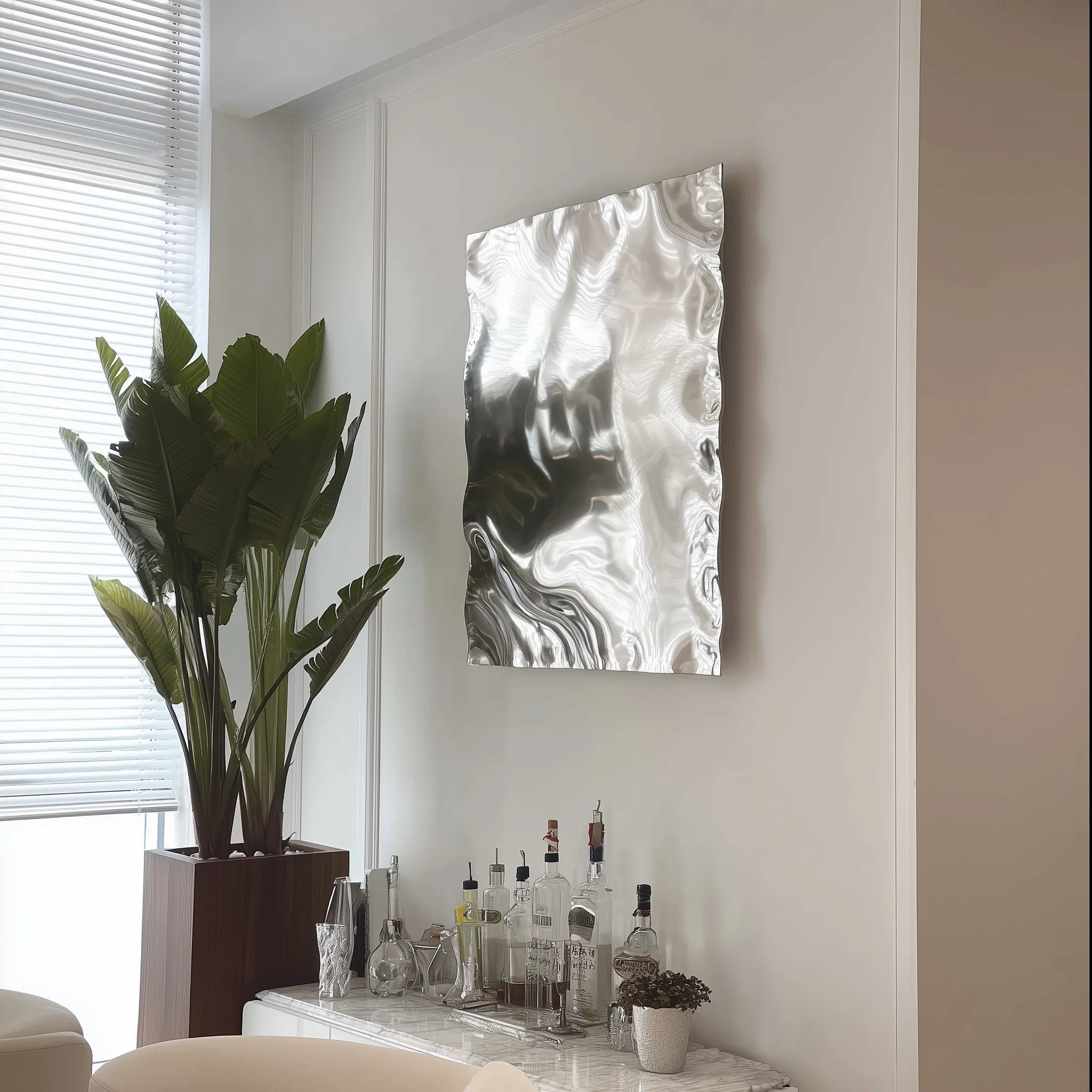 Modern silver stainless steel wall sculpture with ripple effect design for homes, offices, and luxury interiors.