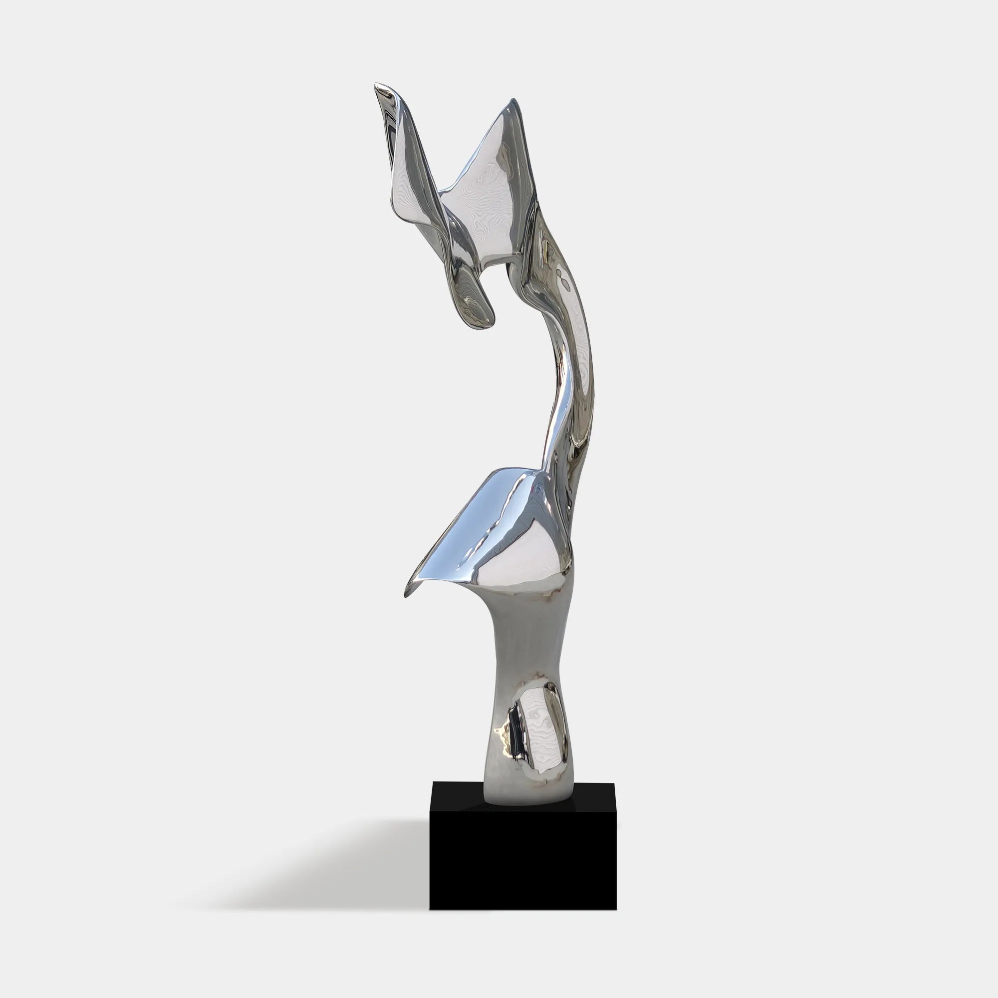 Abstract stainless steel sculpture with modern design for for indoor spaces.