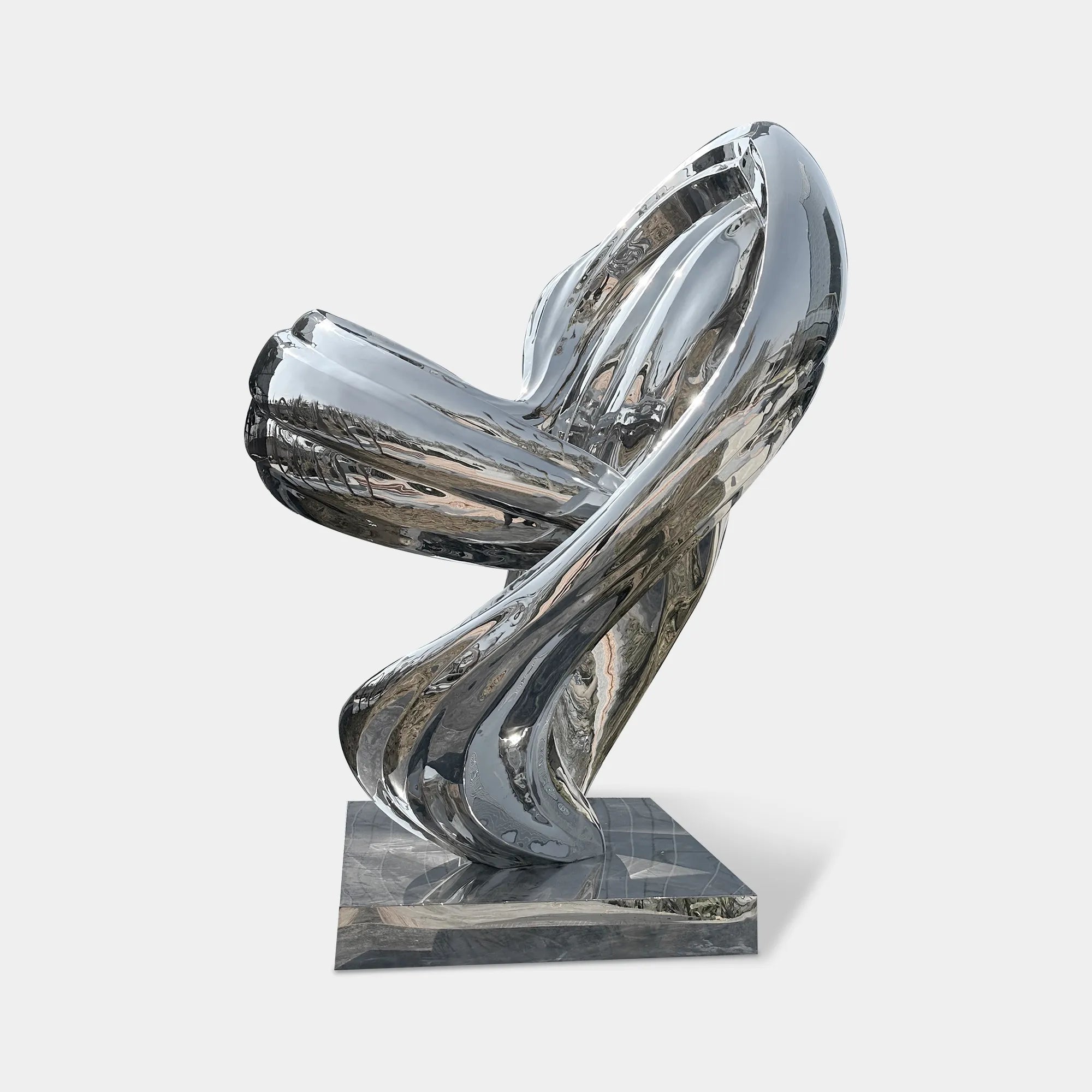 Abstract stainless steel sculpture with flowing interwoven curves and modern polished mirror finish for luxury gardens, plazas, and art galleries.