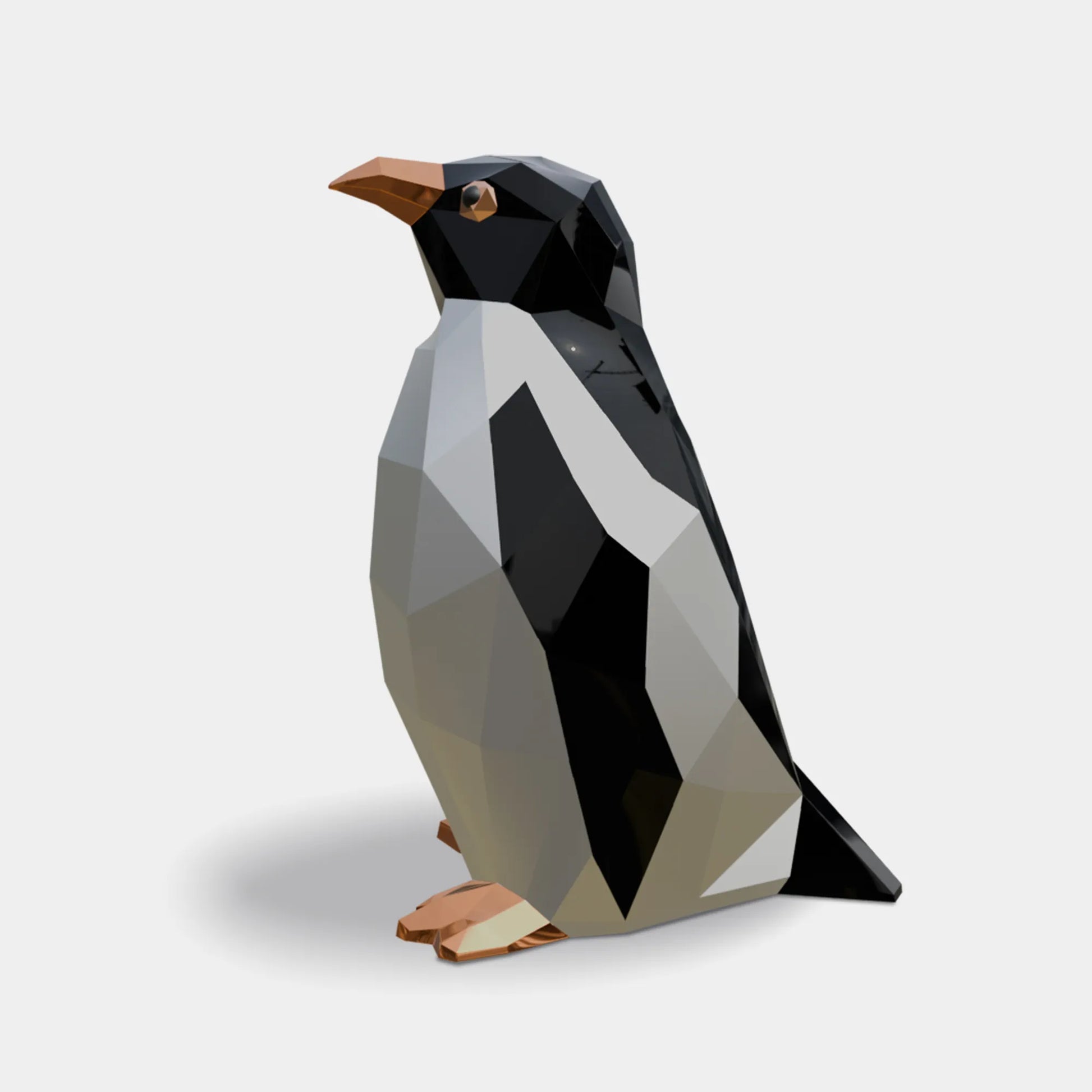 Stainless steel penguin sculpture with geometric faceted surface, modern decorative artwork for villas, gardens, and contemporary interiors.