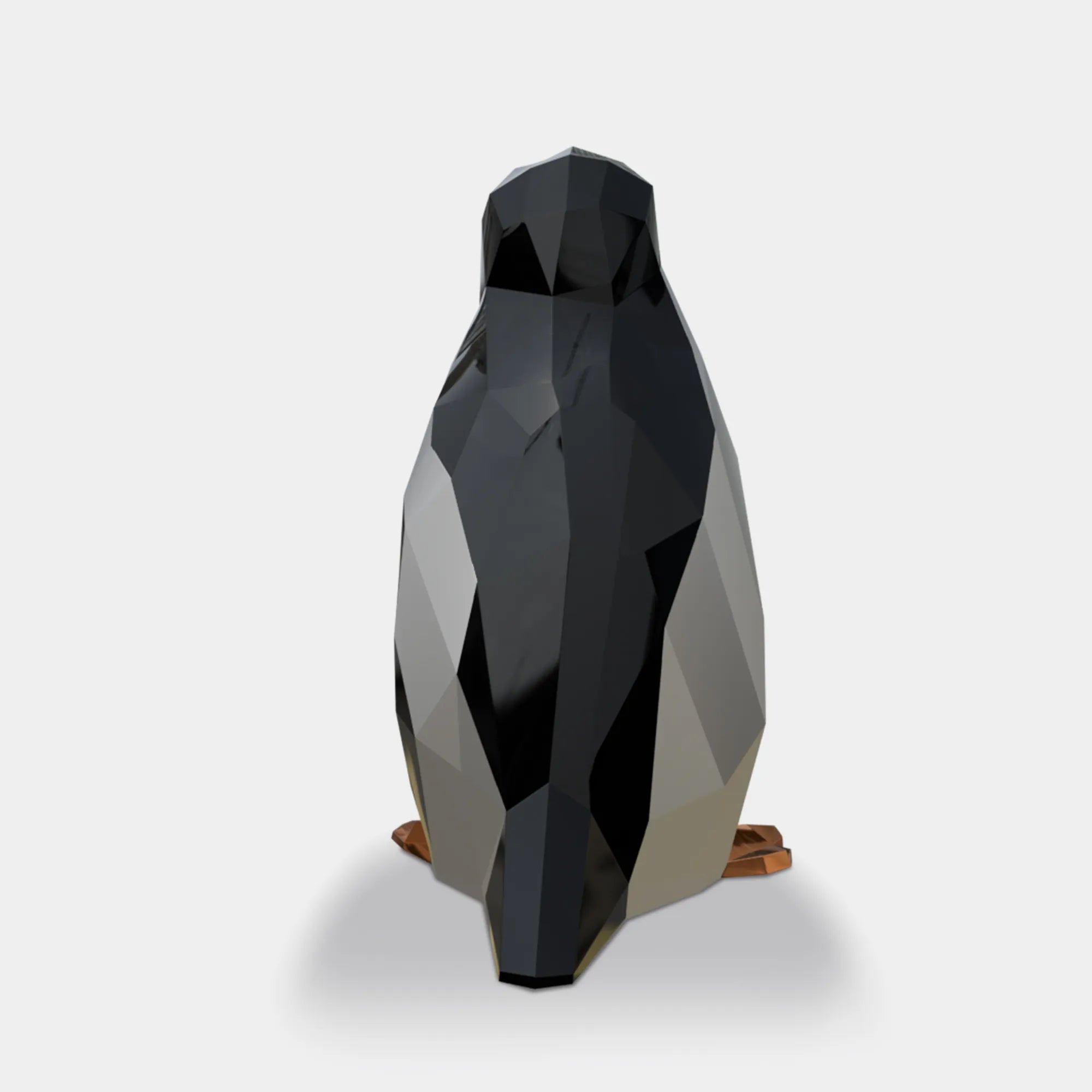 Stainless steel penguin sculpture with geometric faceted surface, modern decorative artwork for villas, gardens, and contemporary interiors.
