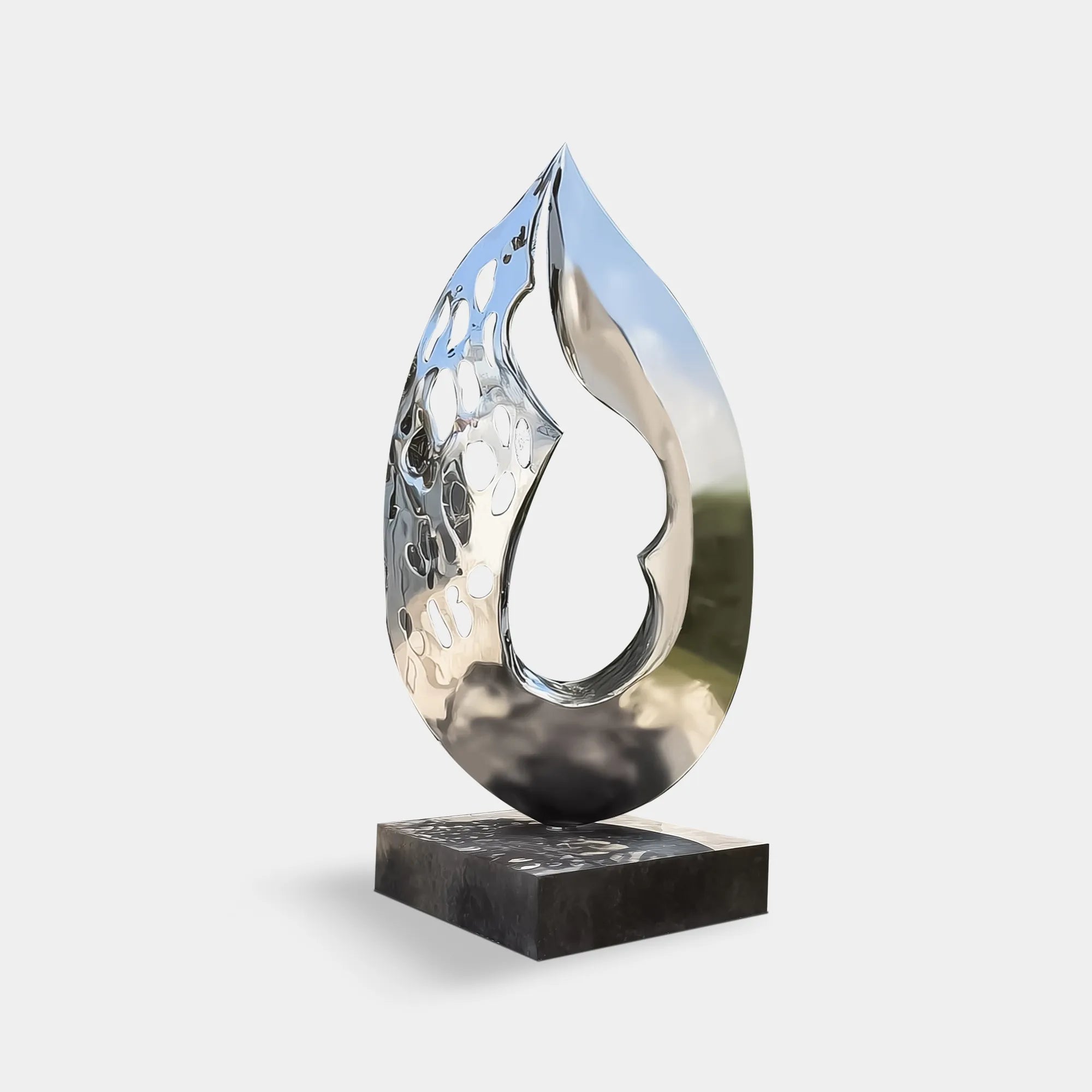 Abstract stainless steel sculpture in modern design for gardens.