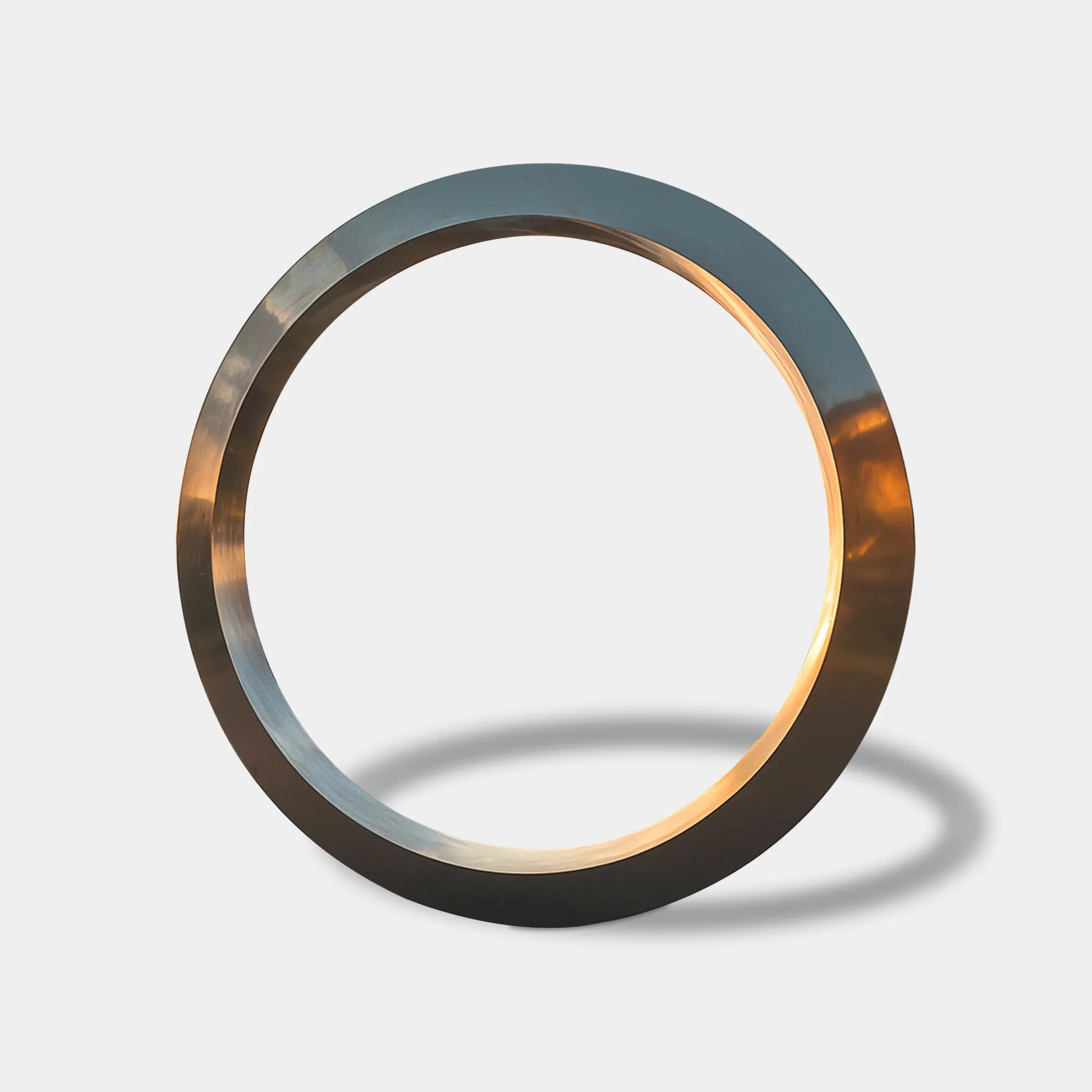 Modern large ring sculpture in stainless steel for plazas.
