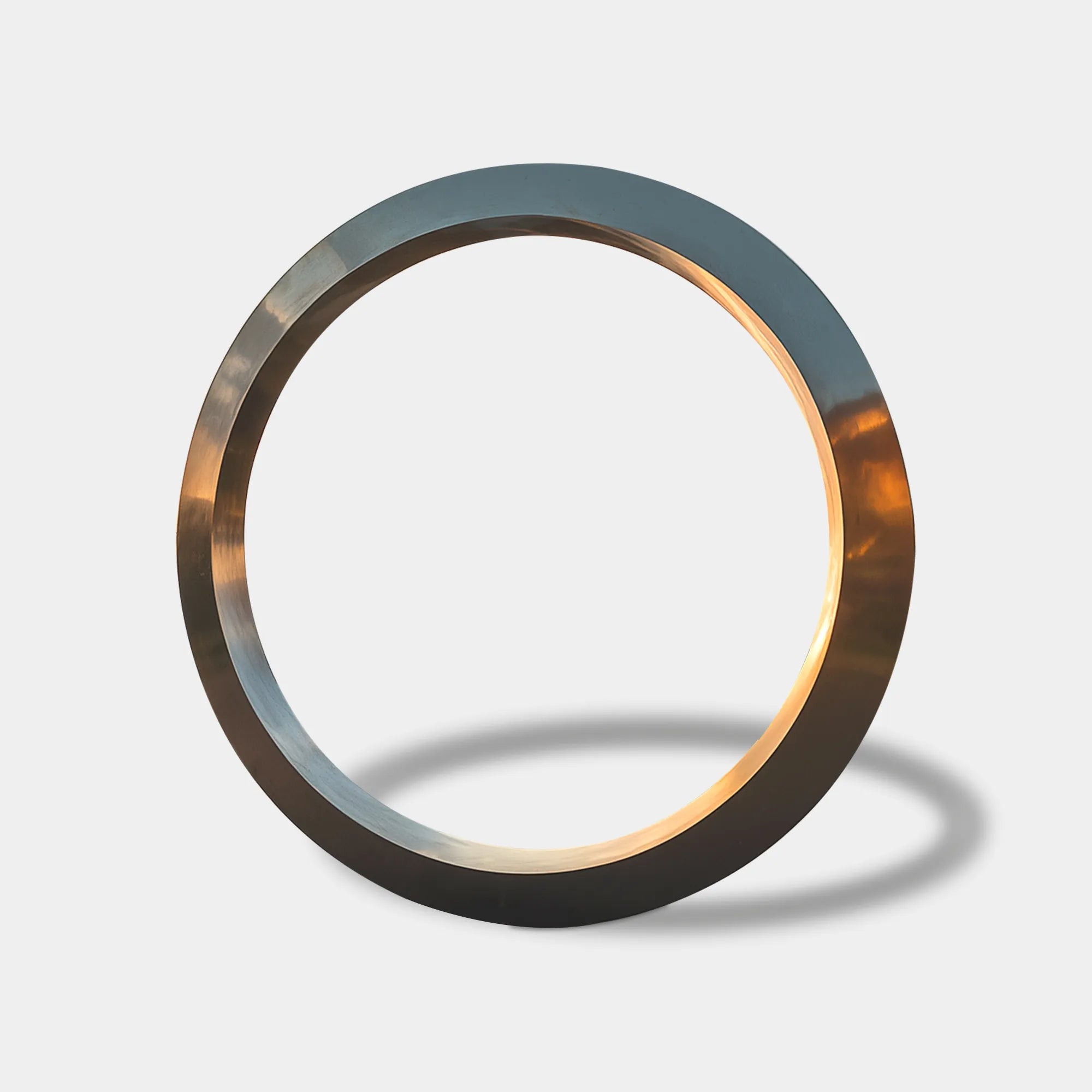 Modern large ring sculpture in stainless steel for plazas.