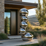 Stainless steel sphere sculpture with abstract design for modern outdoor spaces.