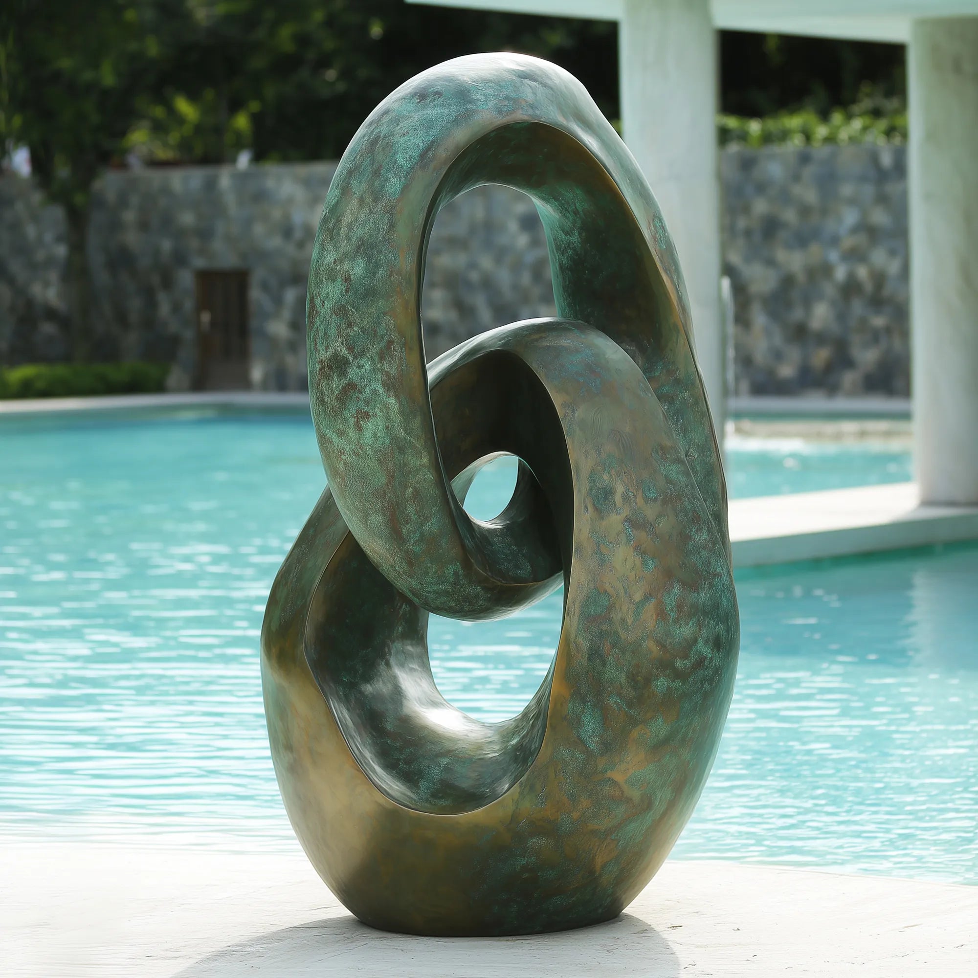 Abstract hand-cast bronze sculpture with verdigris patina, modern outdoor art statue for garden, villa, or poolside decor.