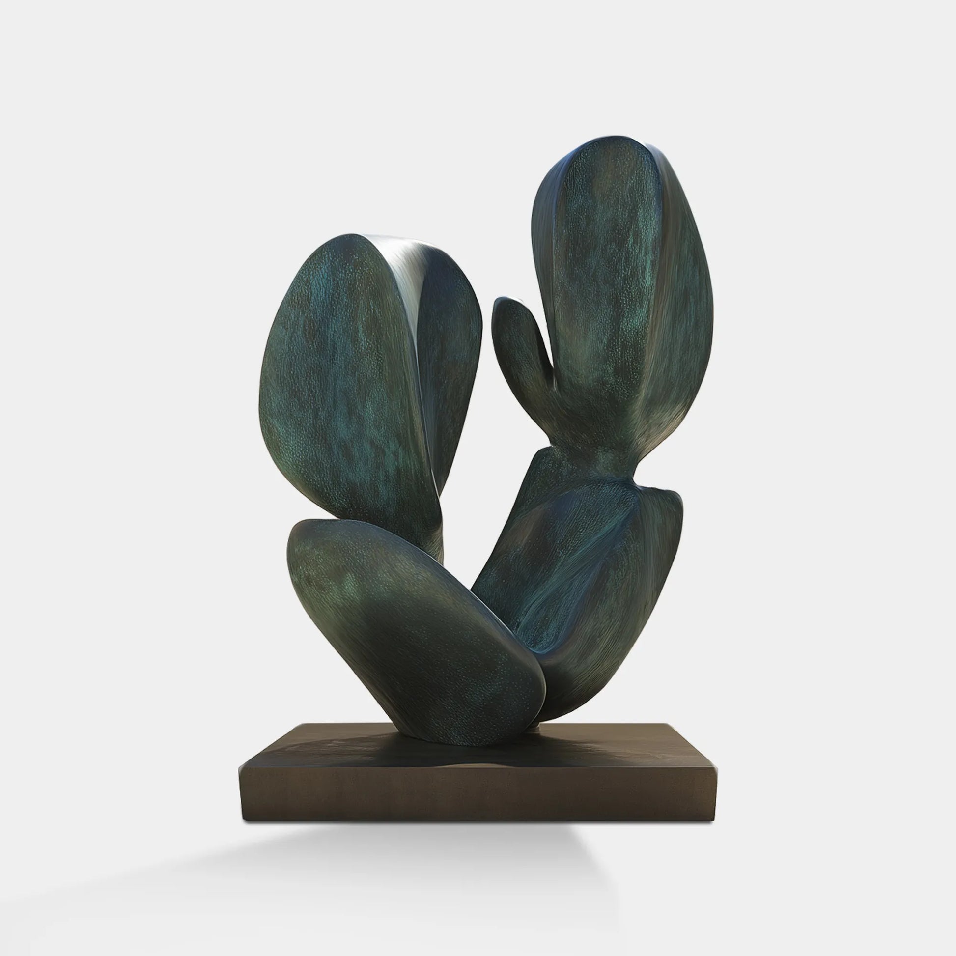 Cactus-inspired bronze sculpture with rounded forms positioned over a shallow pool.