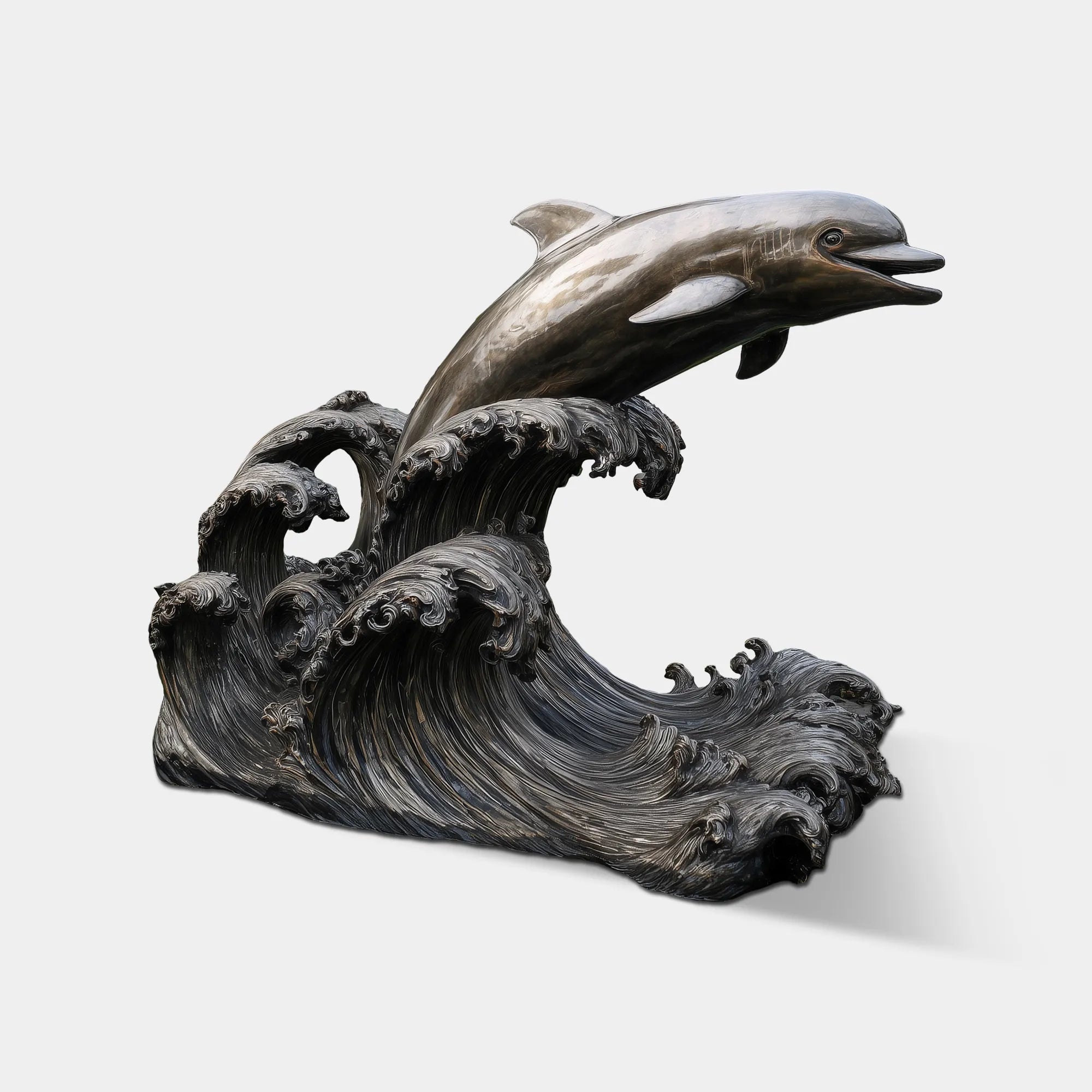 Bronze dolphin sculpture leaping over ocean waves in garden