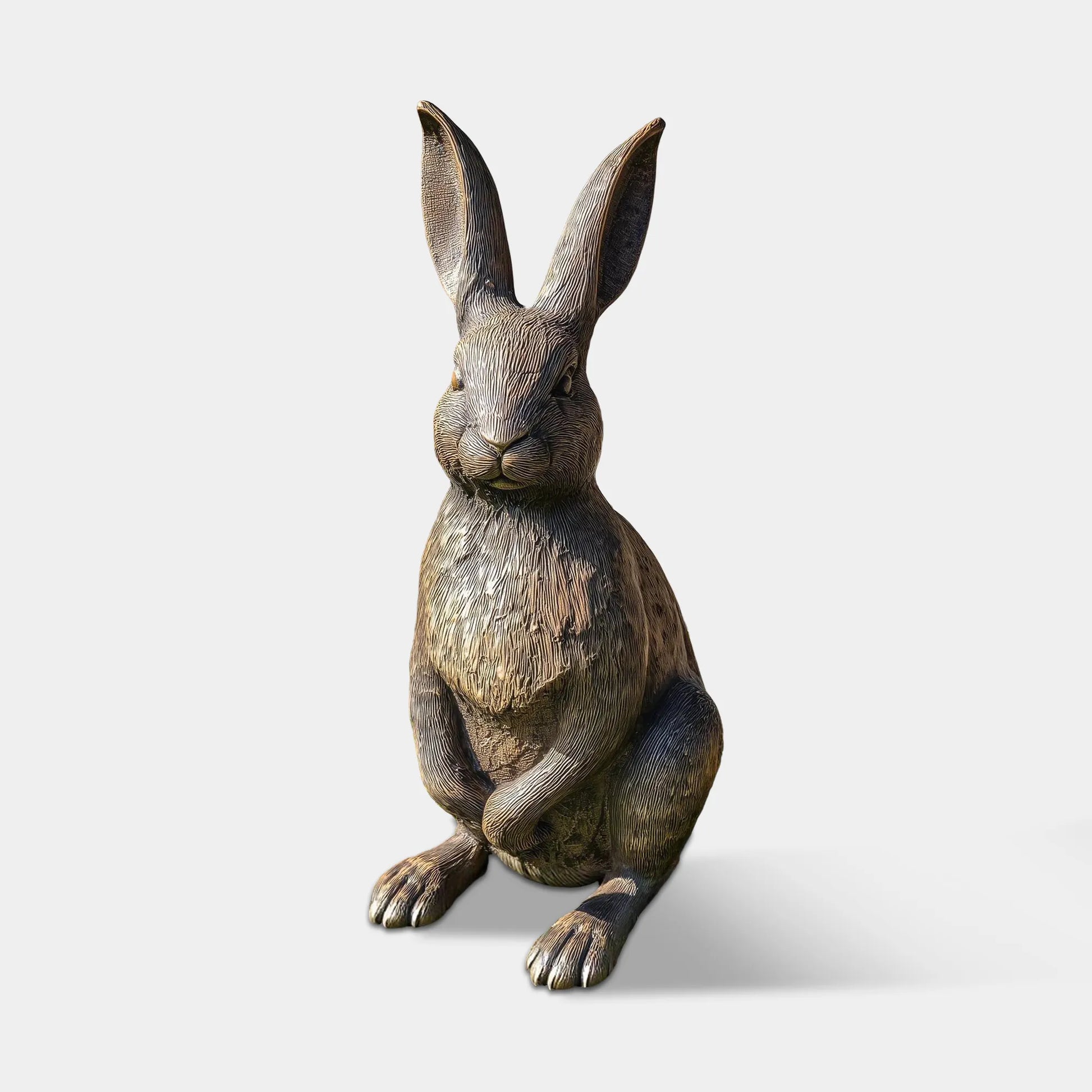 Bronze rabbit sculpture with detailed fur and lifelike features for garden paths, patio floors, living room corners, and entryway.