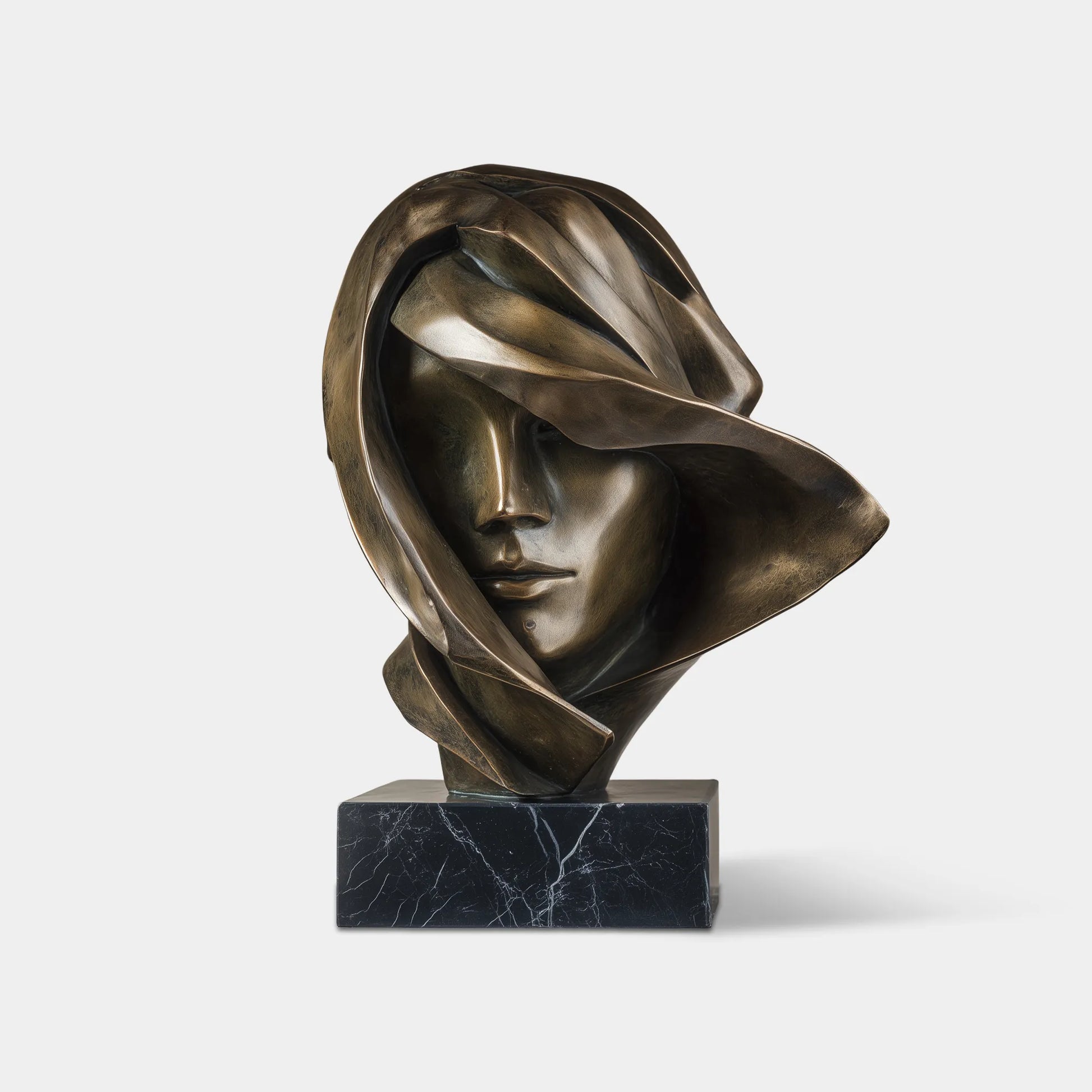 An elegant bronze female bust sculpture rests on a marble shelf with warm backlight and abstract wall art beside it.