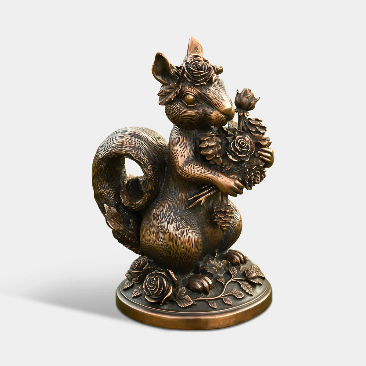 Bronze Squirrel Statue Holding a Bouquet of Roses and Pinecones, Featuring a Rose on Its Head, Detailed Fur Texture, Curled Tail, and Floral Decorations on a Round Base