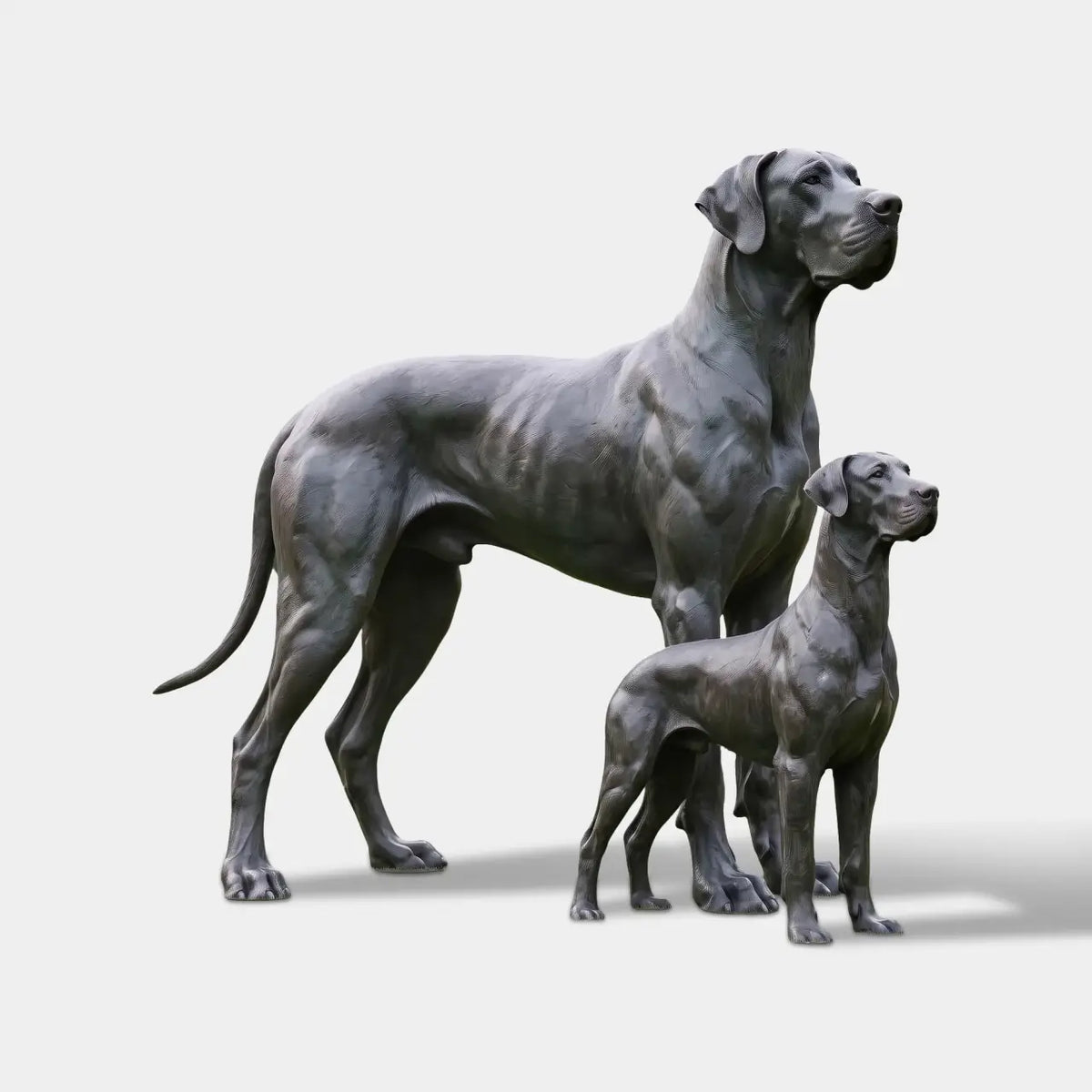 Dark Bronze Sculpture of Two Standing Great Dane Dogs in Different Sizes, Featuring Muscular Bodies, Detailed Faces, and Natural Poses on a Green Garden Lawn