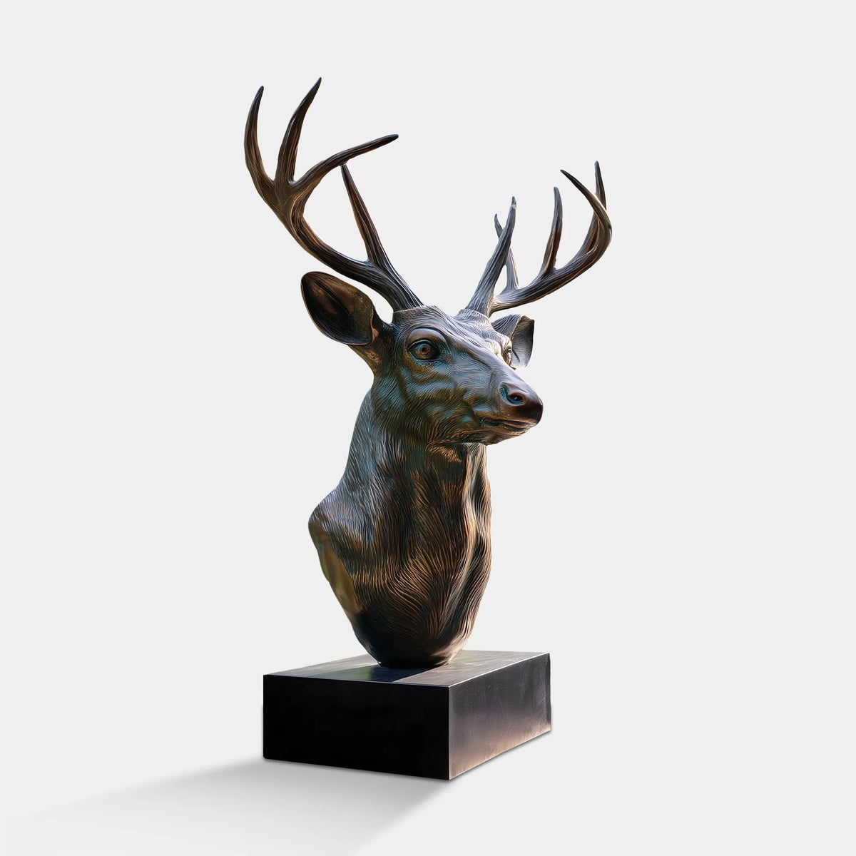 Dark Bronze Deer Bust Sculpture with Large Branching Antlers, Detailed Facial Features, Textured Fur, and a Rectangular Base