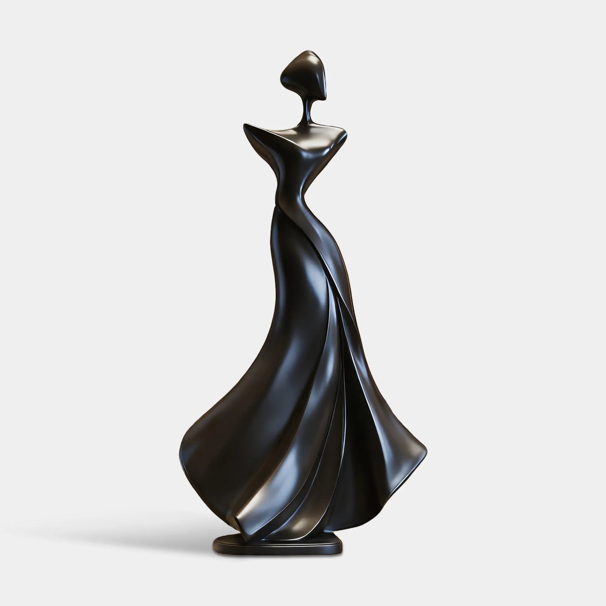 Black abstract bronze sculpture with flowing form in living room corner near white wall and window. 