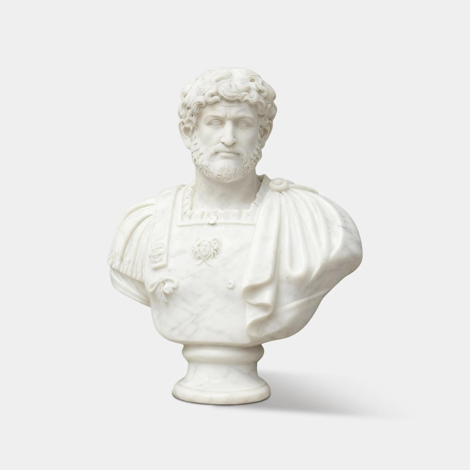 Hadrian marble bust sculpture on a desktop in a home study.