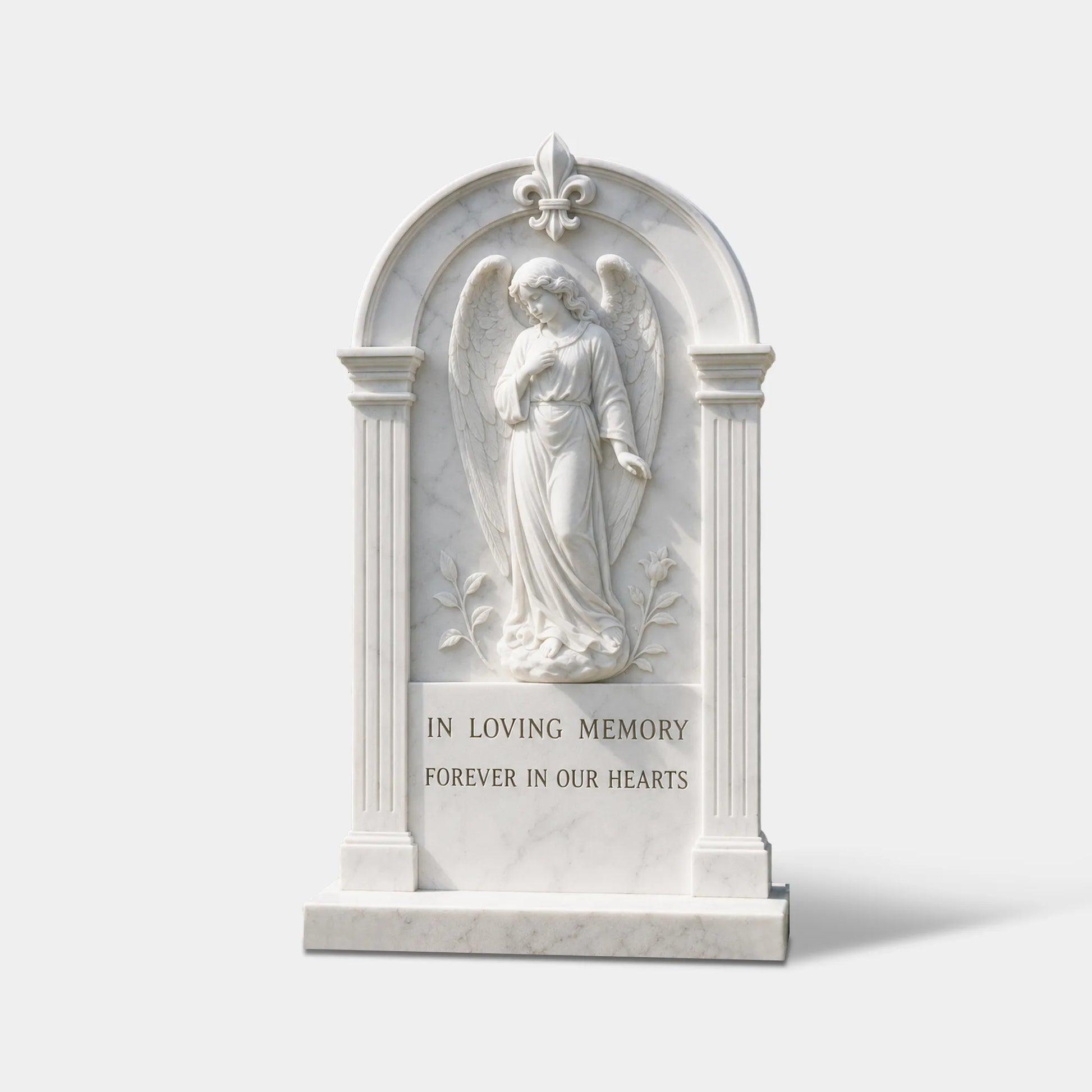 Marble angel relief carved on a white stone memorial tombstone in cemetery.