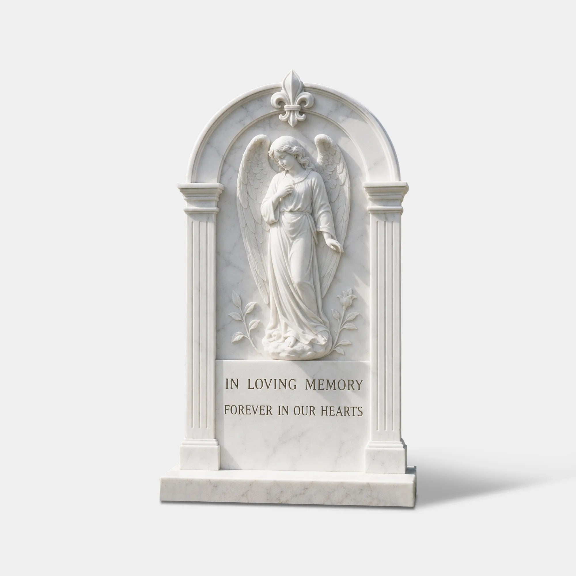 Marble angel relief carved on a white stone memorial tombstone in cemetery.