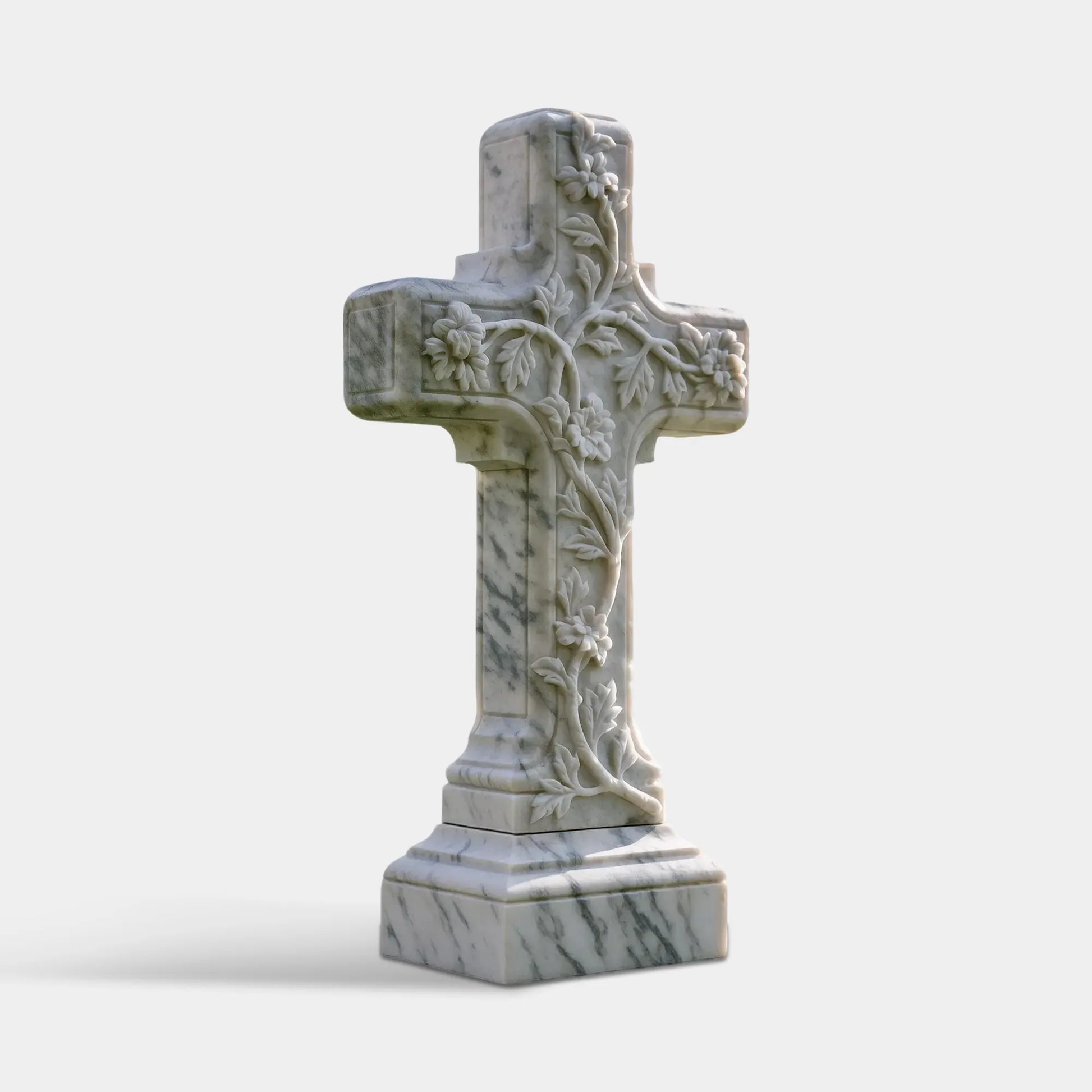 Natural white marble cross tombstone with carved vines and flowers, detailed floral patterns and custom engraving.