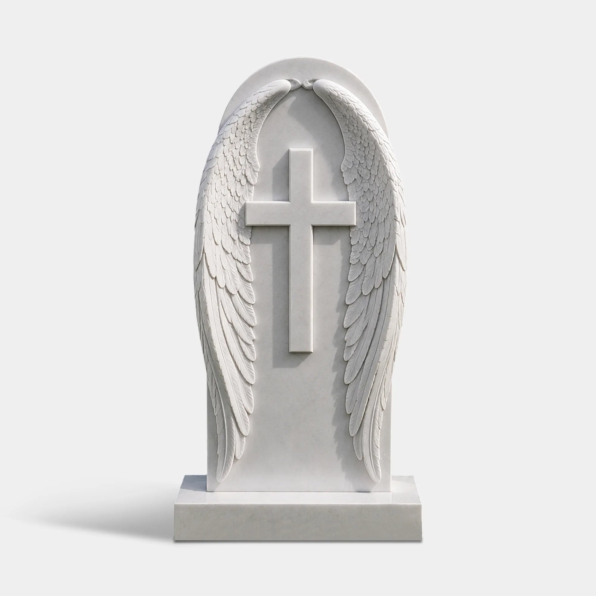 Oval white marble wing cross headstone stands on the green cemetery lawn.