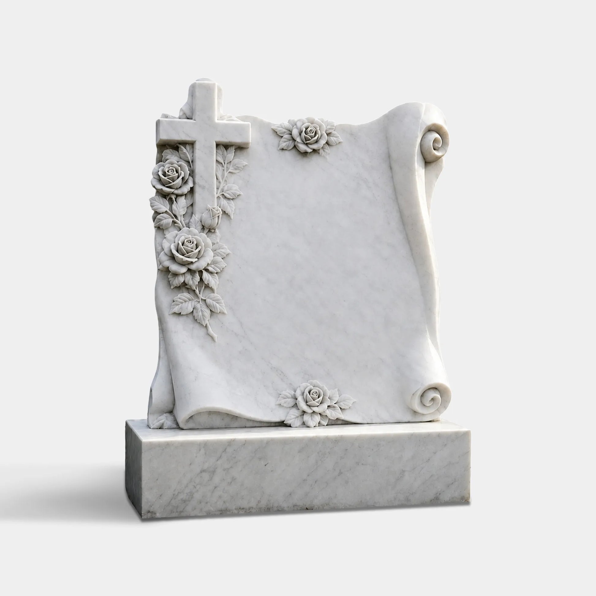 White marble Christian memorial headstone with a carved cross, roses, leafy vines, scroll corners, blank inscription panel, and rectangular base in a landscaped cemetery.