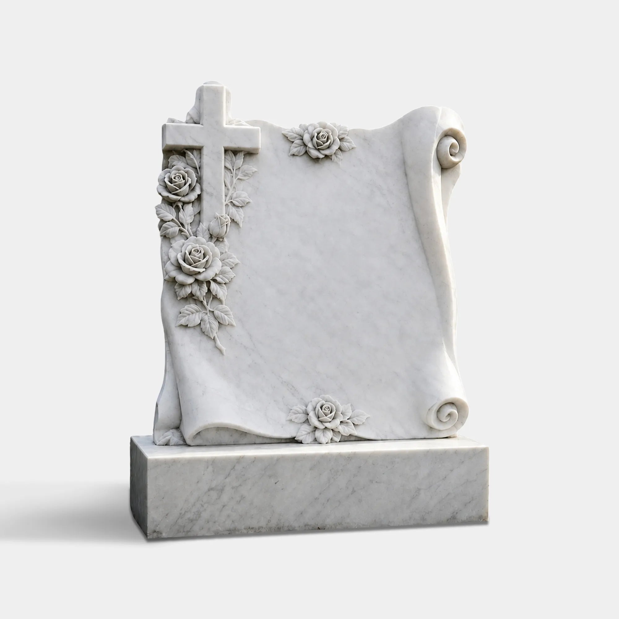 White marble Christian memorial headstone with a carved cross, roses, leafy vines, scroll corners, blank inscription panel, and rectangular base in a landscaped cemetery.