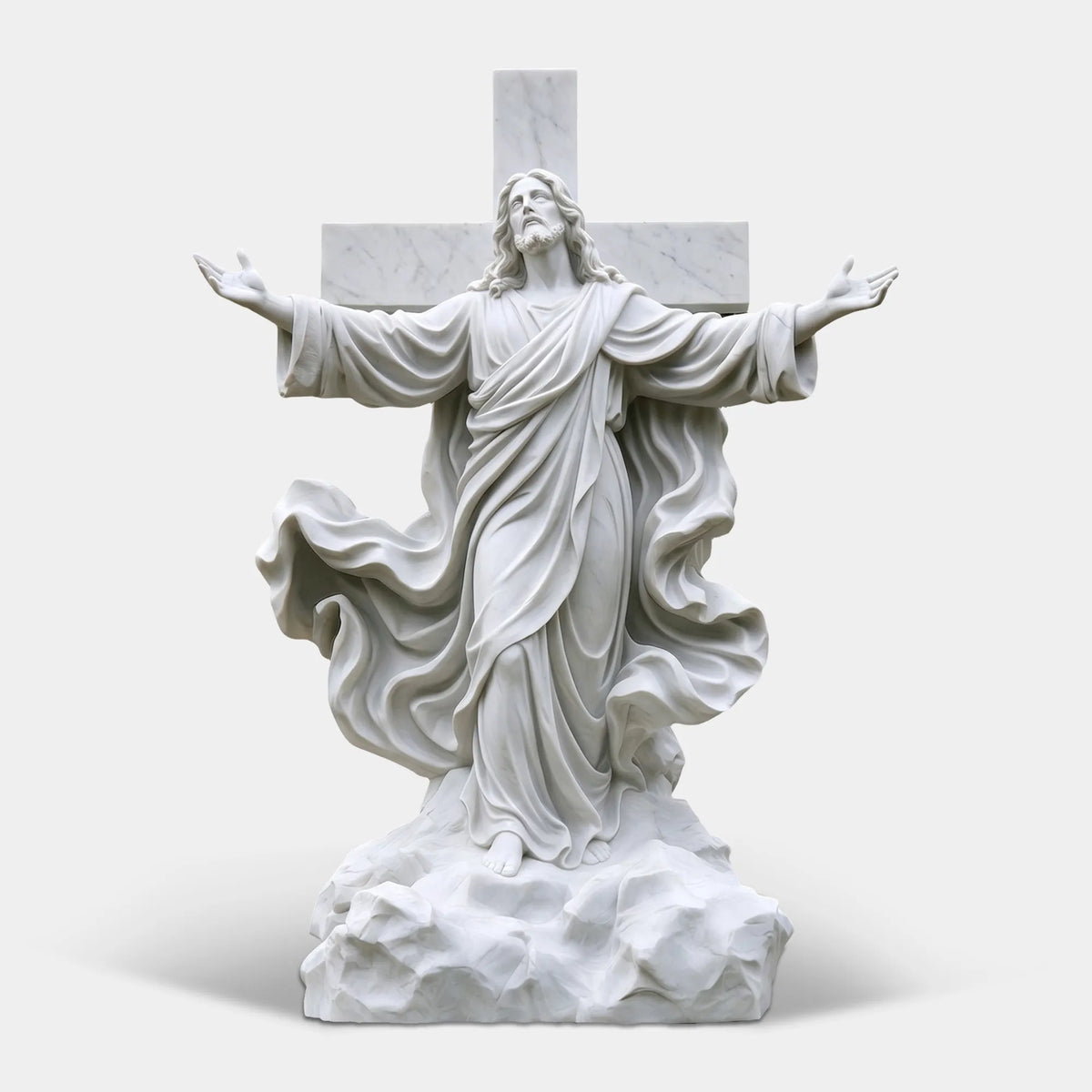 White marble Jesus Christ statue with cross stands on a marble base surrounded in a courtyard.