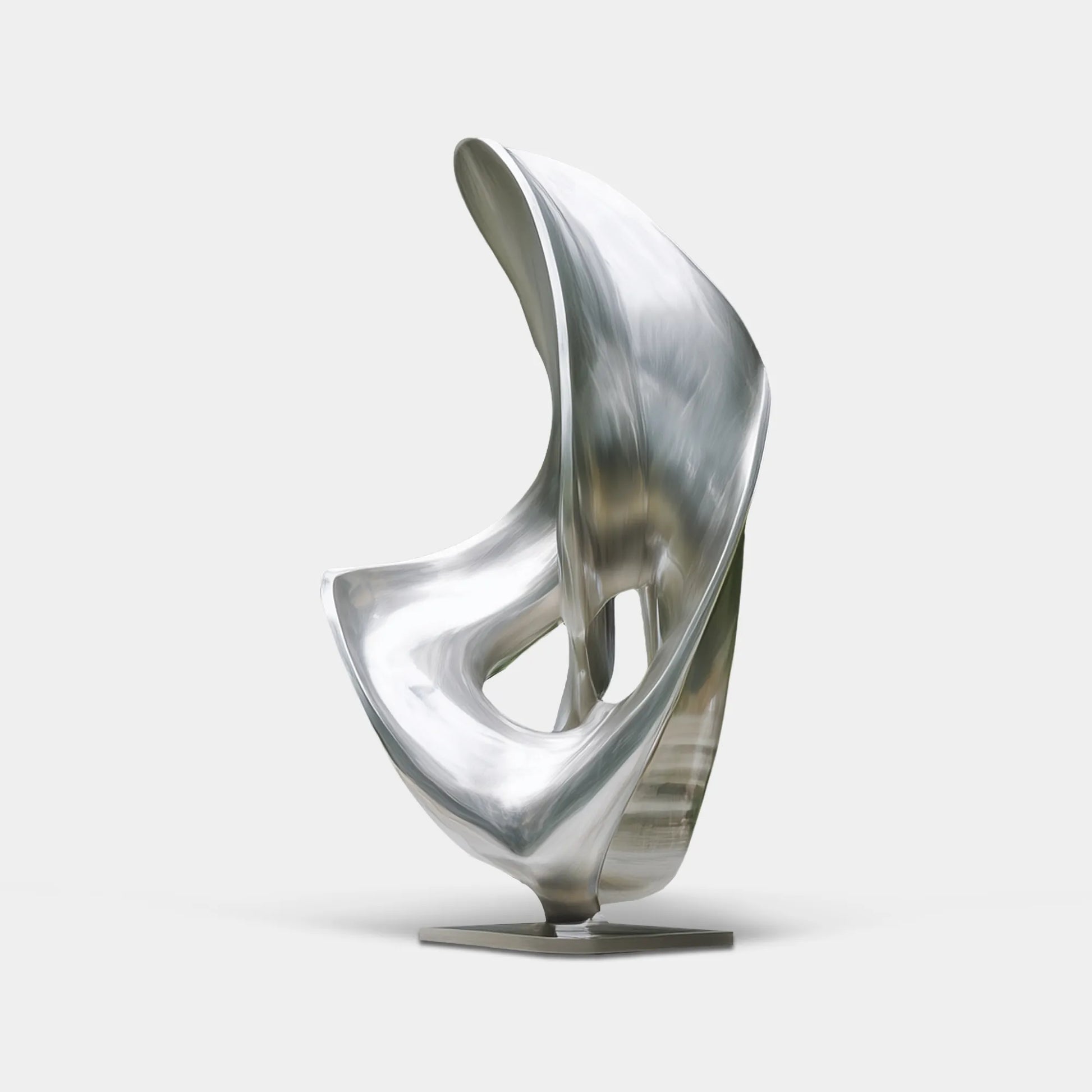 Polished stainless steel abstract sculpture with flowing organic curves on a marble base in a residential courtyard