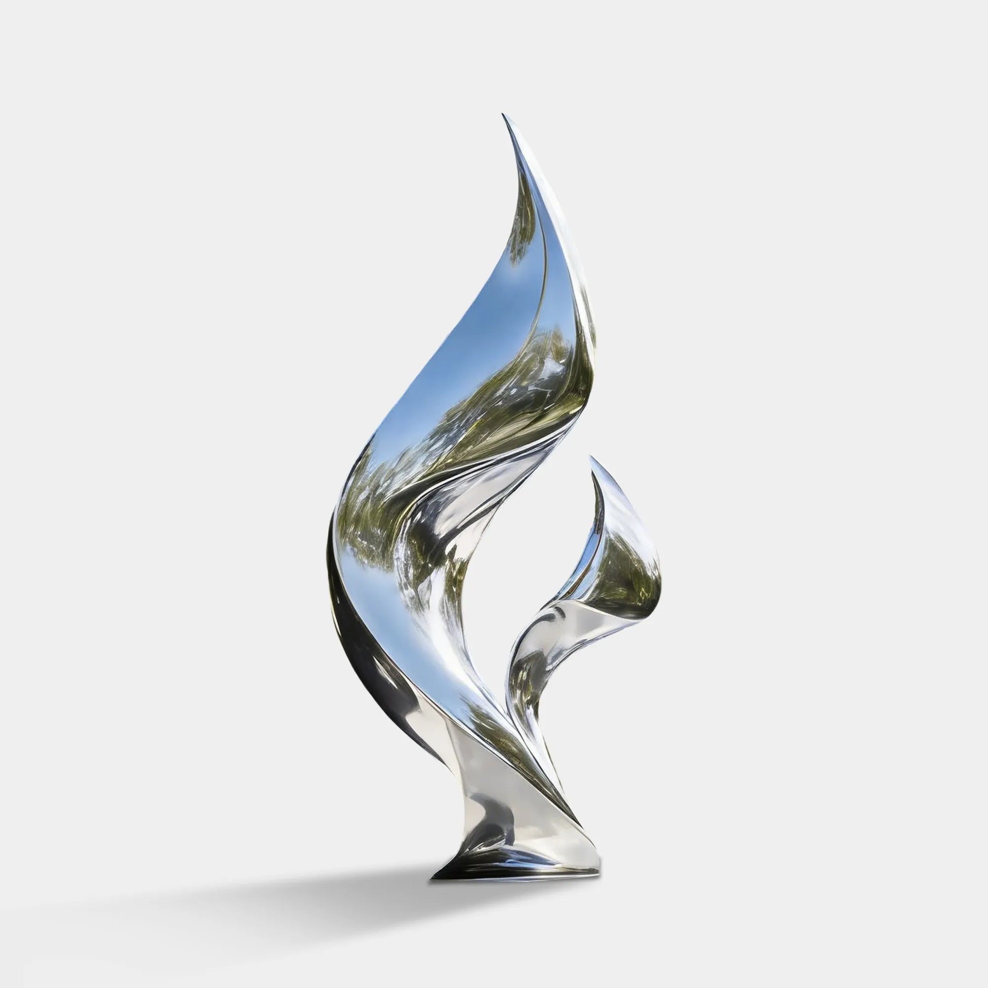 Mirror polished stainless steel flowing form sculpture on a marble base in a modern forest villa courtyard. 