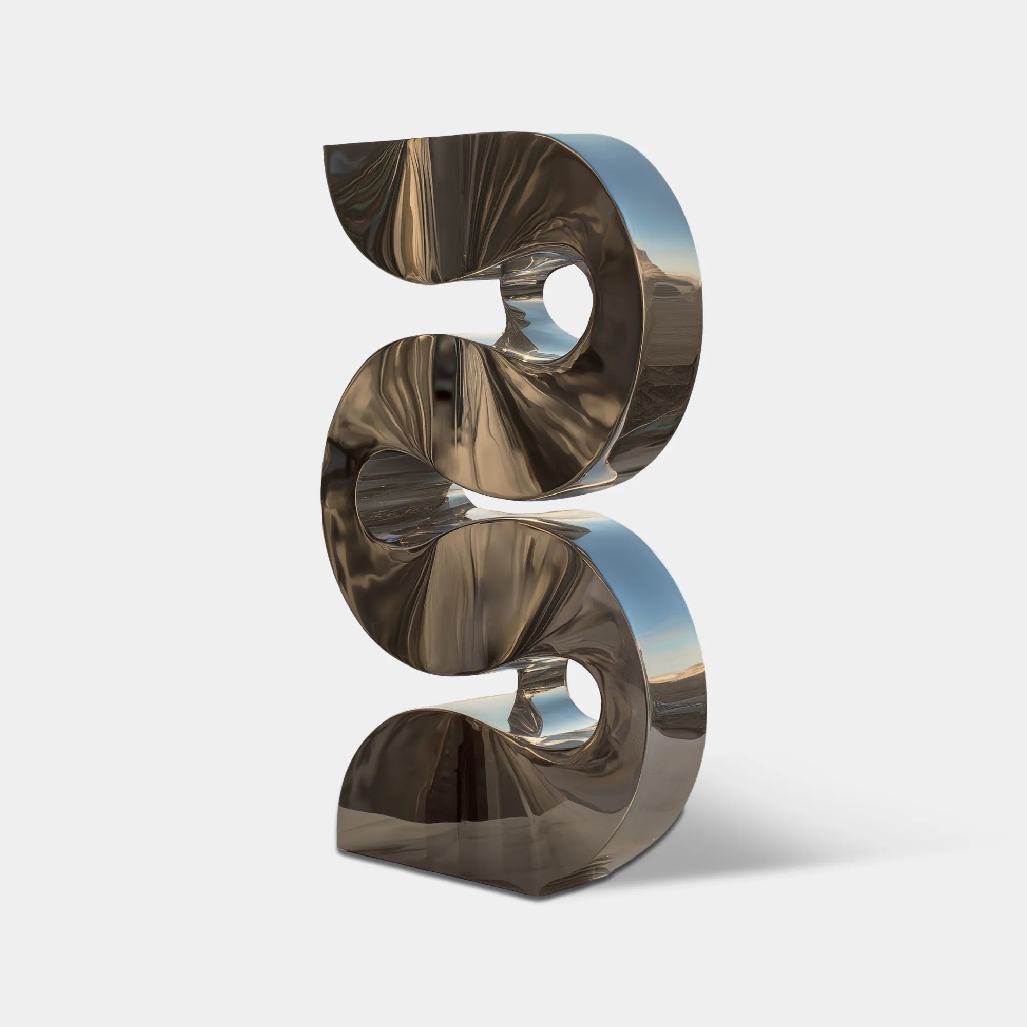 A reflective twisted spiral stainless steel sculpture sits on white stone rooftop overlooking sea and white coastal buildings.